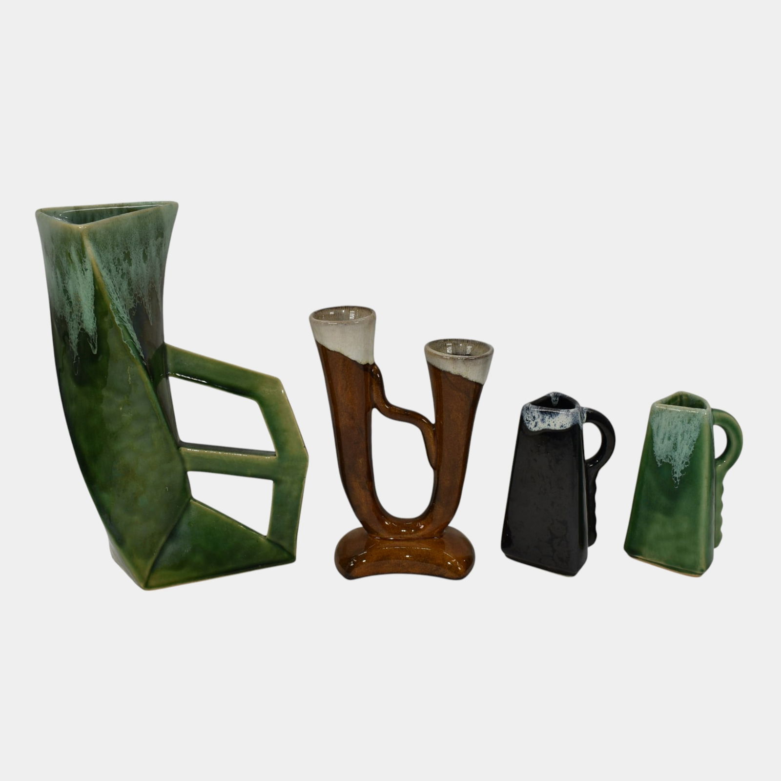 Anna Van Briggle Vintage Art Deco Vases And Pitchers: We offer in house shipping on all items. Plus spend $500 on winning bids and your shipping is free. Anna Van Briggle Vintage Art Deco Vases And Pitchers Nice art deco form with a nice glaze.Excellent