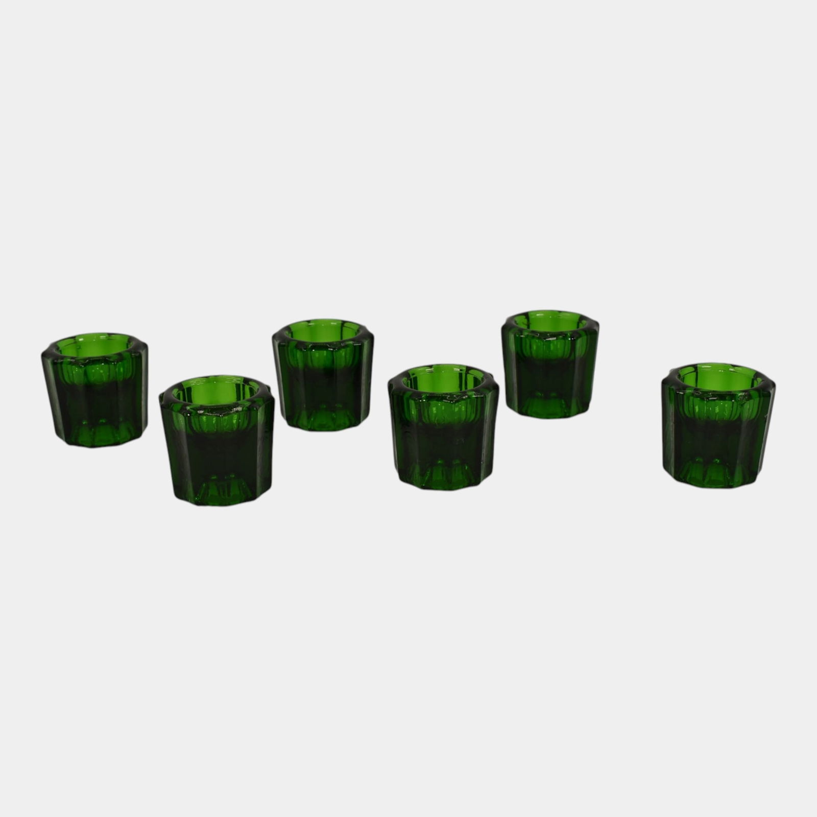Dark Green Glass Votive Candle Cups Set Of 6: We offer in house shipping on all items. Plus spend $500 on winning bids and your shipping is free. Dark Green Glass Votive Candle Cups Set Of 6 Excellent condition. Non-showing nicks to bases of two.