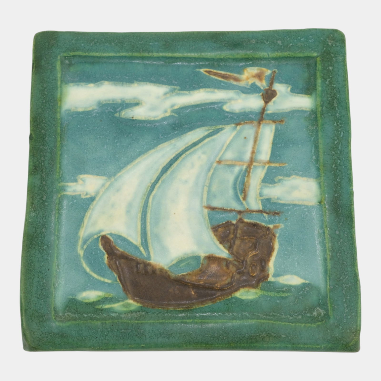 Ephraim Faience Early Art Pottery Product Development "North Wind" Ship Tile: We offer in house shipping on all items. Plus spend $500 on winning bids and your shipping is free. Ephraim Faience Early Art Pottery Product Development "North Wind" Ship Tile Ephraim Faience Pottery