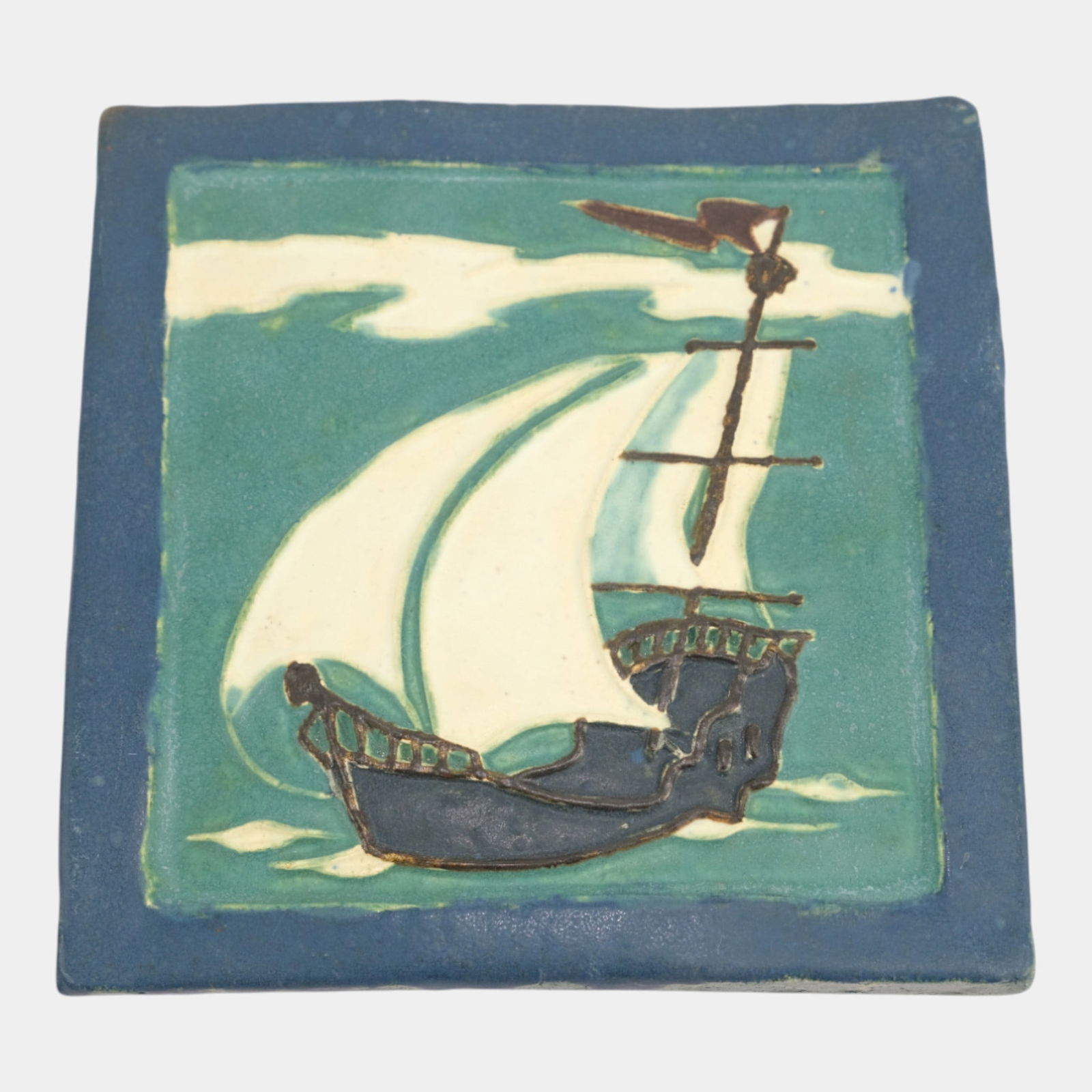 Ephraim Faience Early Art Pottery Product Development "North Wind" Ship Tile: We offer in house shipping on all items. Plus spend $2000 on winning bids on qualified items and your shipping is free. Ephraim Faience Early Art Pottery Product Development "North Wind" Ship Tile Ep