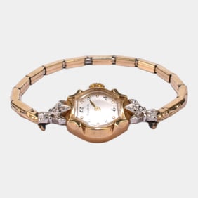 Bulova 14K Gold Diamond Accented Case Ladies Wrist Watch With Gold Tone Band