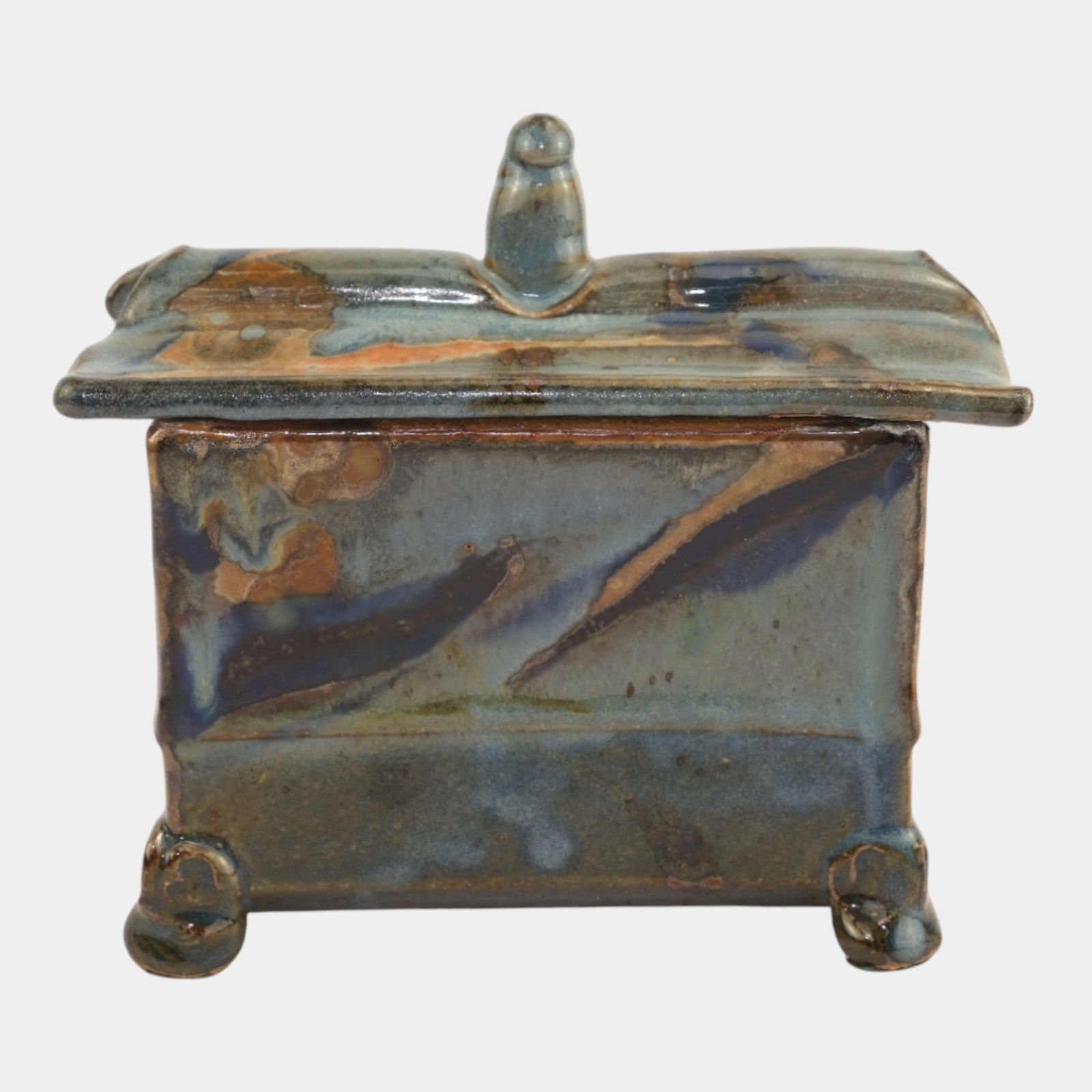 John Glick (1938-2017) Plum Tree Pottery Lidded Rectangular Box With Finial: John Glick (1938-2017) Plum Tree Pottery Lidded Rectangular Box With Finial A finely crafted studio pottery lidded box by John Glick, featuring painterly glaze work in flowing tones of blue, brown,