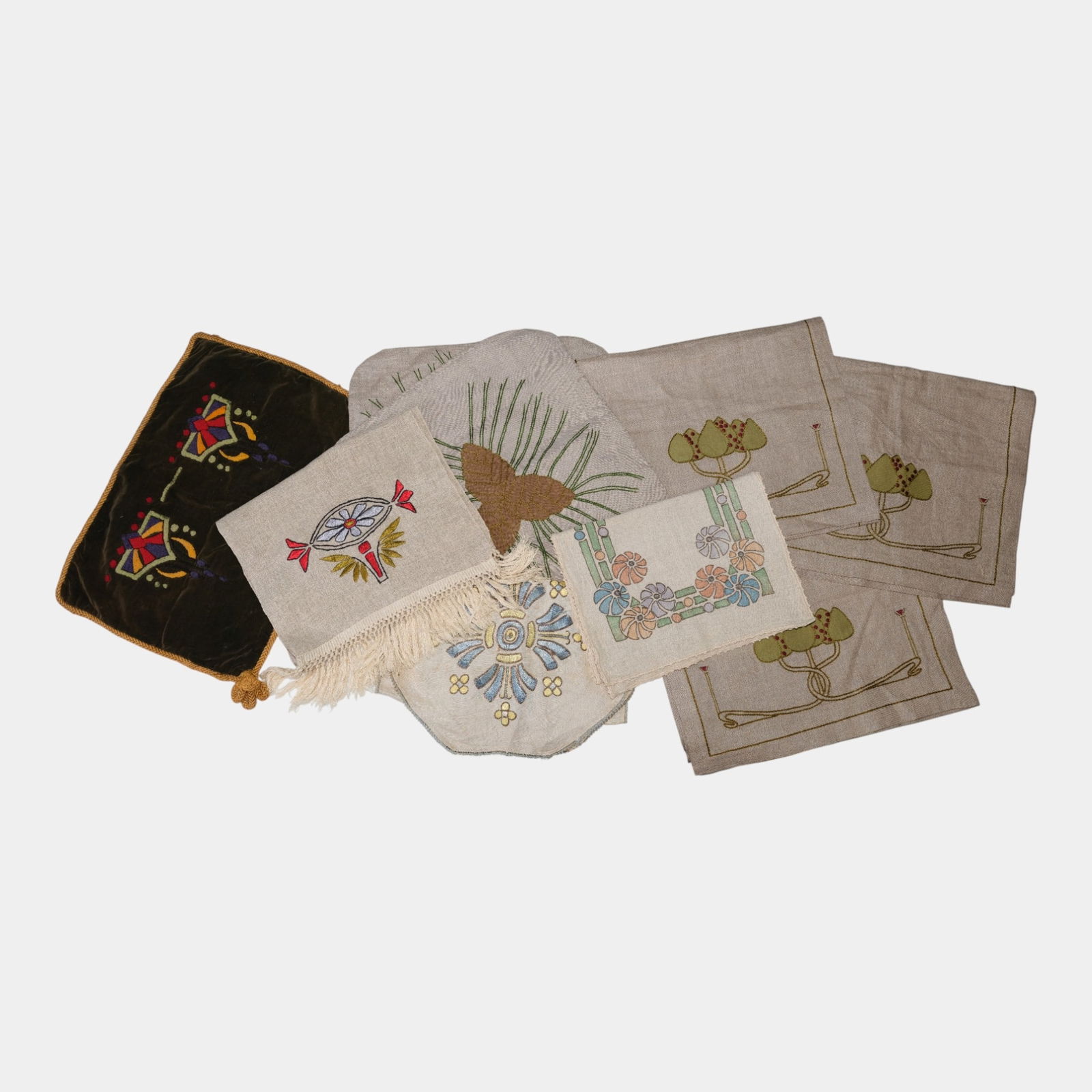 Antique Arts & Crafts Designed Linen Table Runners And Pillow Cases: Antique Arts & Crafts Designed Linen Table Runners And Pillow Cases A charming assortment of early 20th-century hand-embroidered linens, including doilies and placemats with floral, geometric, and nat