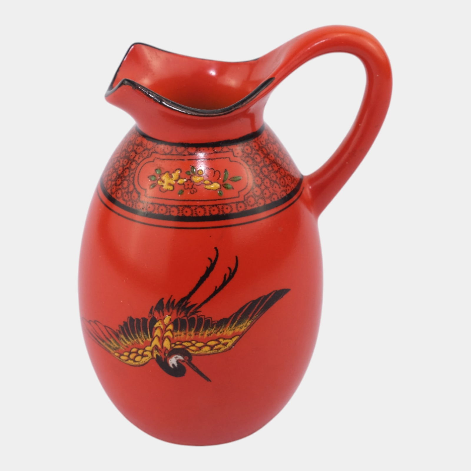 Shelley 1930s English Art Deco Red "Kutani Crane" Hand Painted Handled Pitcher: Shelley 1930s English Art Deco Red "Kutani Crane" Hand Painted Handled Pitcher Striking Shelley pitcher in vivid red with a detailed flying crane and banded floral decoration. Elegant form with bold A