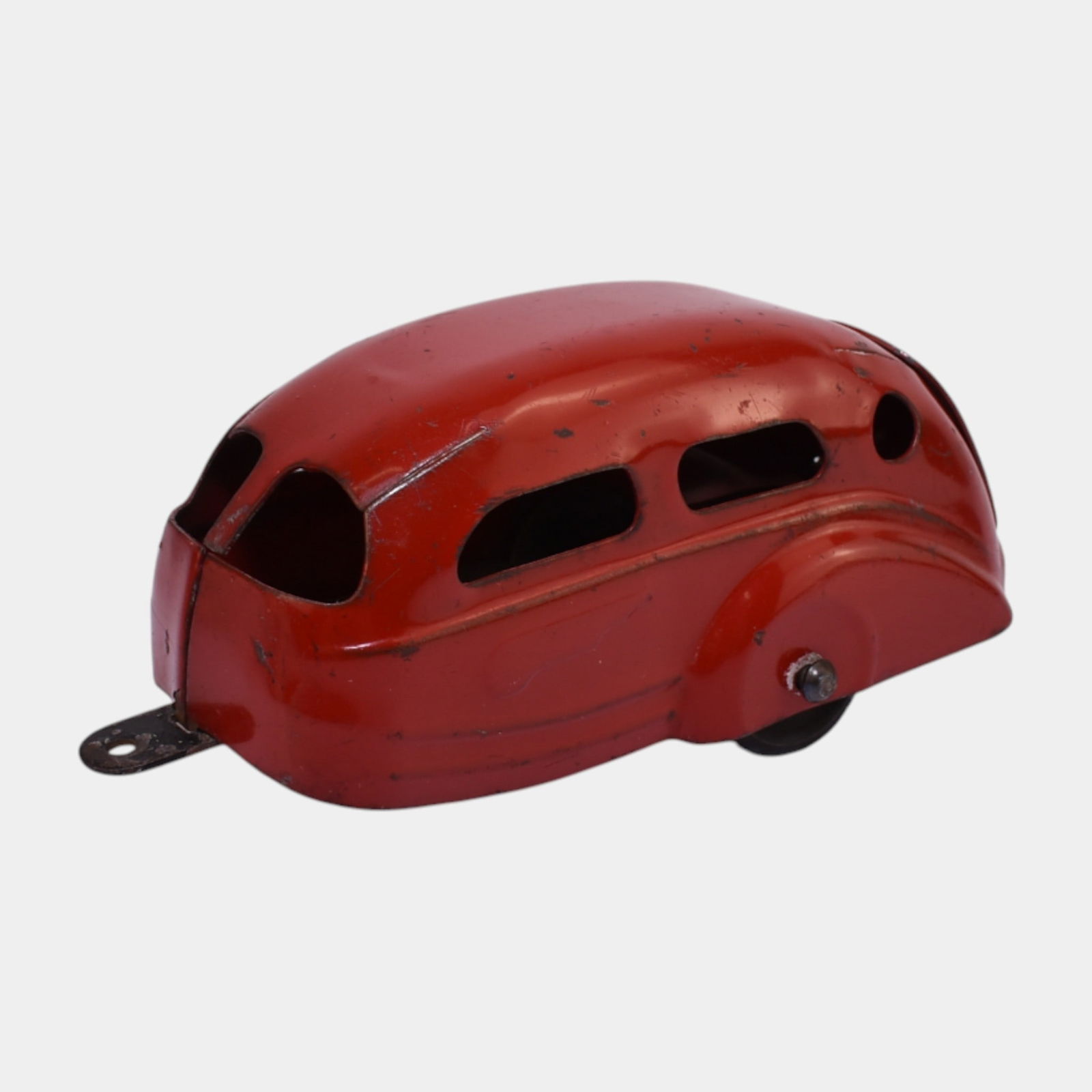 Wyandotte USA 1930s Red Pressed Steel Airstream Camper Trailer: Wyandotte USA 1930s Red Pressed Steel Airstream Camper Trailer Vintage Wyandotte pressed-steel toy trailer in classic red enamel finish, showcasing sleek Art Deco styling and rounded windows. A fine