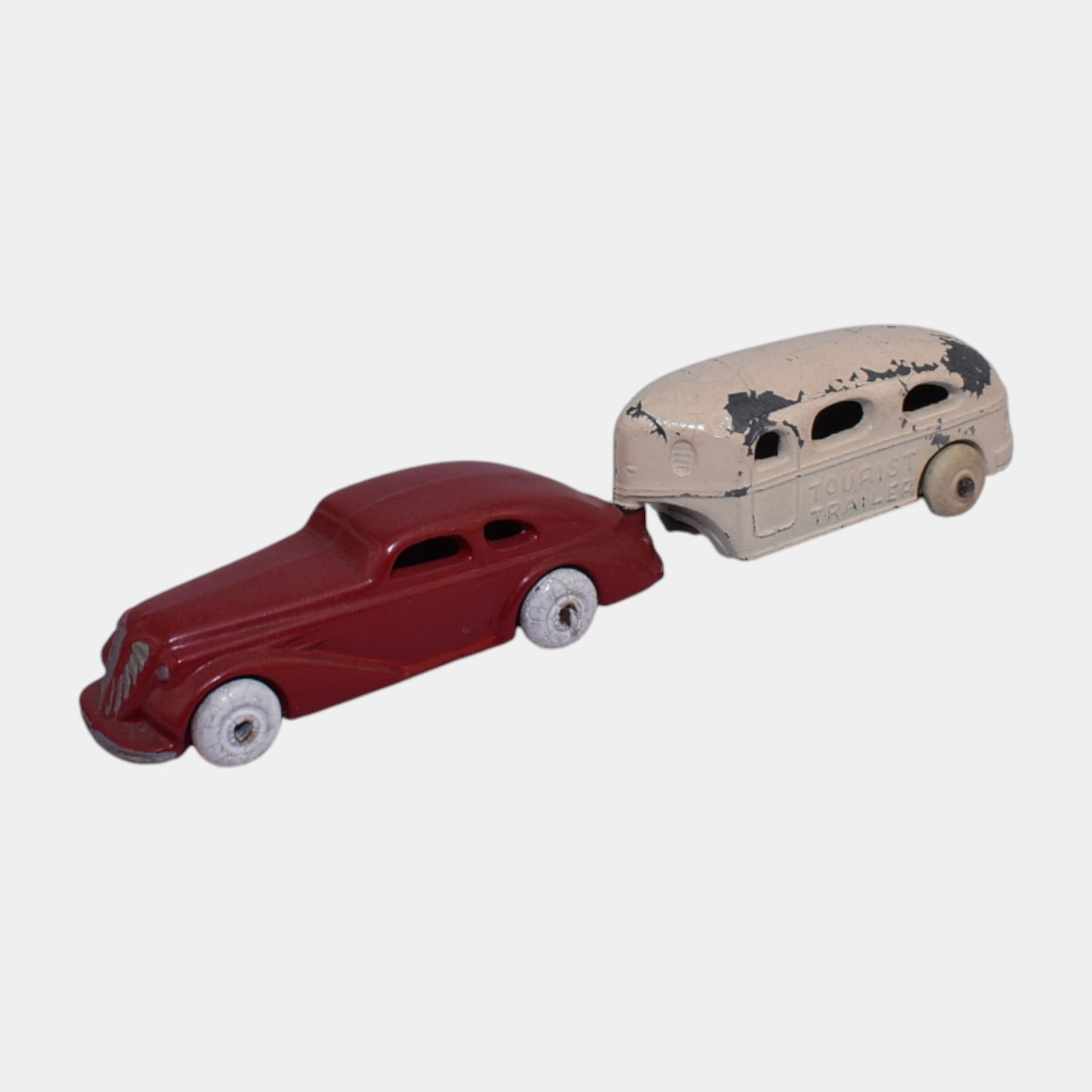 Barclay USA 1930s Toy Slush Cast Sedan Red Car and White Tourist Trailer: Barclay USA 1930s Toy Slush Cast Sedan Red Car and White Tourist Trailer Streamlined Barclay die-cast car with matching cream â€œTourist Trailer.â€? A classic 1930s toy pairing showing ea