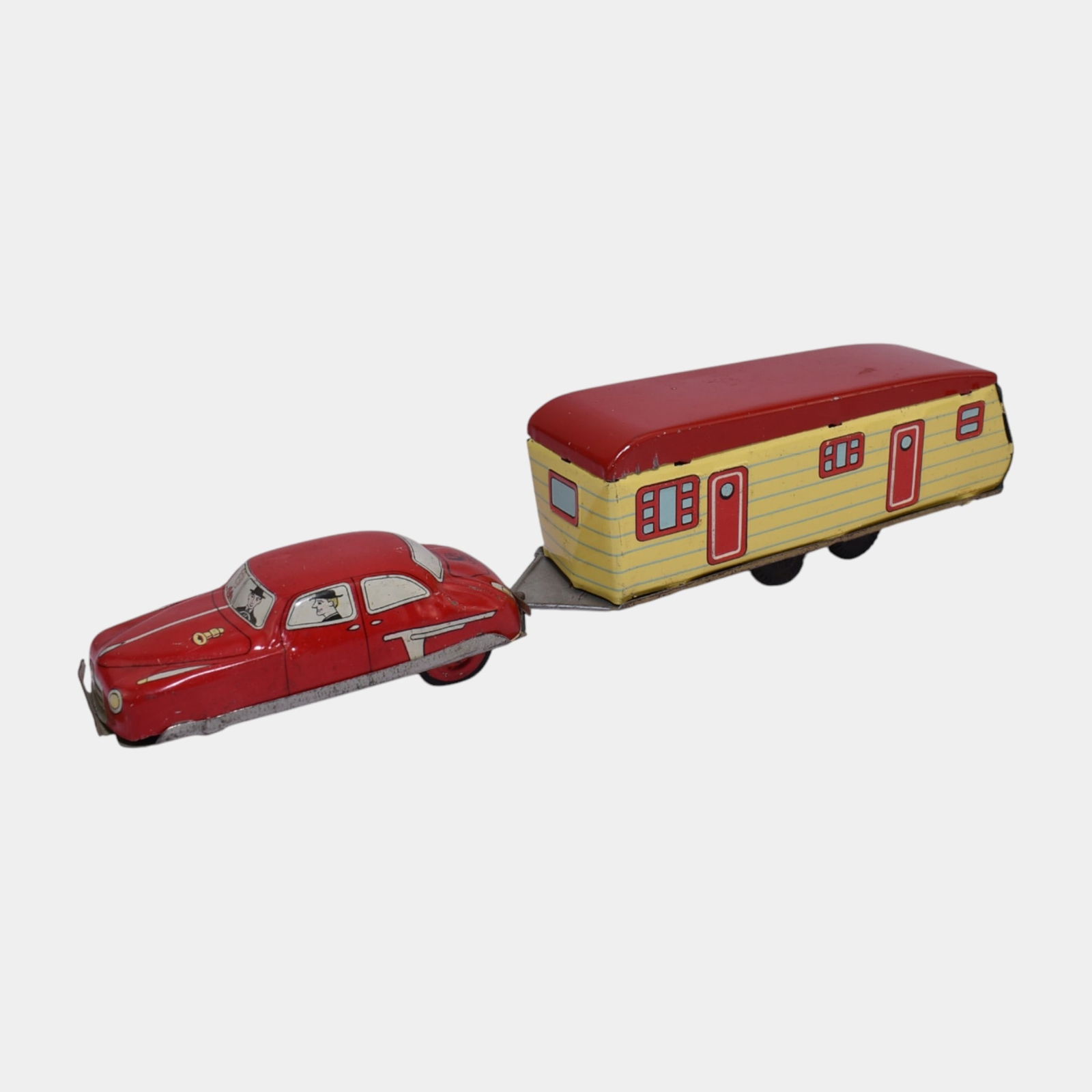 Bandai Japan 1950s Tin Litho Toy Red Friction Car and Yellow Caravan Trailer: Bandai Japan 1950s Tin Litho Toy Red Friction Car and Yellow Caravan Trailer Colorful tin lithographed Bandai car and two-axle trailer in red and yellow. Features charming mid-century detailing and