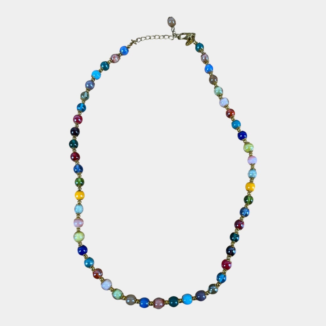 Murano Glass Bead 25" Necklace With Multicolor Round Beads & Gold-Tone Accents: Vibrant Murano glass bead necklace featuring a strand of multicolored art-glass beads accented with gold-tone spacers and findings. Signed â€œMurano.â€? Bright, playful, and beautifully c