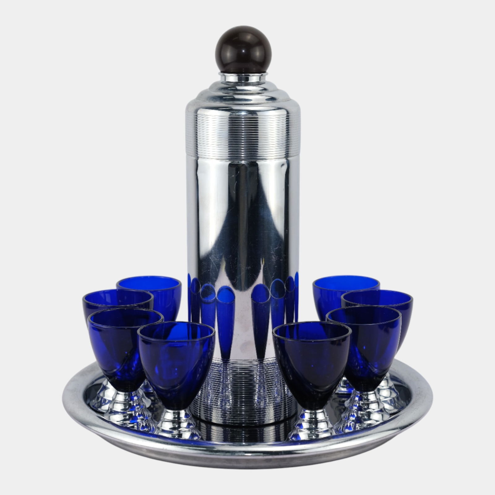 Larelle Guild For Chase Art Deco Blue Moon Glass & Chrome Cocktail Shaker Set: Larelle Guild For Chase Art Deco Blue Moon Glass & Chrome Cocktail Shaker Set Chase Blue Moon complete SET designed by Larelle Guild: Cocktail Shaker, set of six (6) blue glass cups, & chrome tray