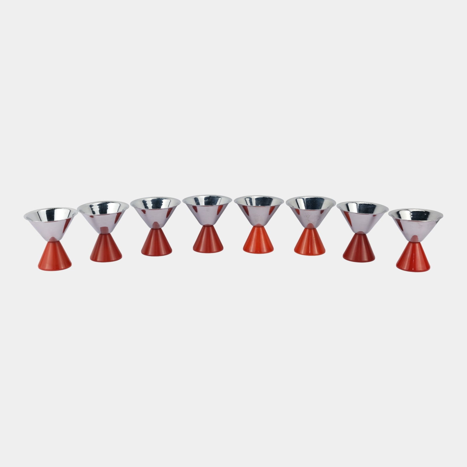 Forman Brothers 1930s Art Deco Chrome & Red Bakelite Cocktail Shaker Cup Set: Forman Brothers 1930s Art Deco Chrome & Red Bakelite Cocktail Shaker Cup Set Forman Set of 8 Chrome & Red Catalin Cocktail / Martini Cups. Deco chrome top & red pyramid Catalin / Bakelite angular base