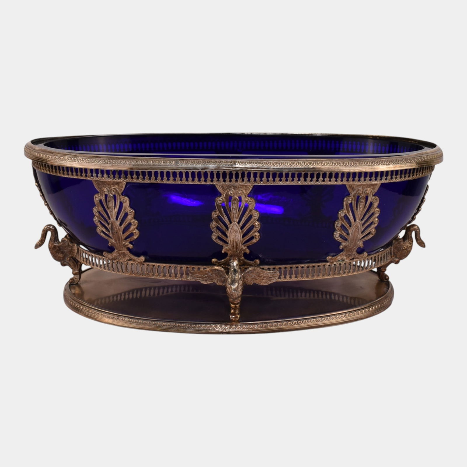 European 800 Silver Centerpiece With Figural Bird Feet Cobalt Blue Glass Insert: European 800 Silver Centerpiece With Figural Bird Feet Cobalt Blue Glass Insert Opulently dramatic and richly ornamental, this Empire-style centerpiece features a deep cobalt blue glass basin mounted