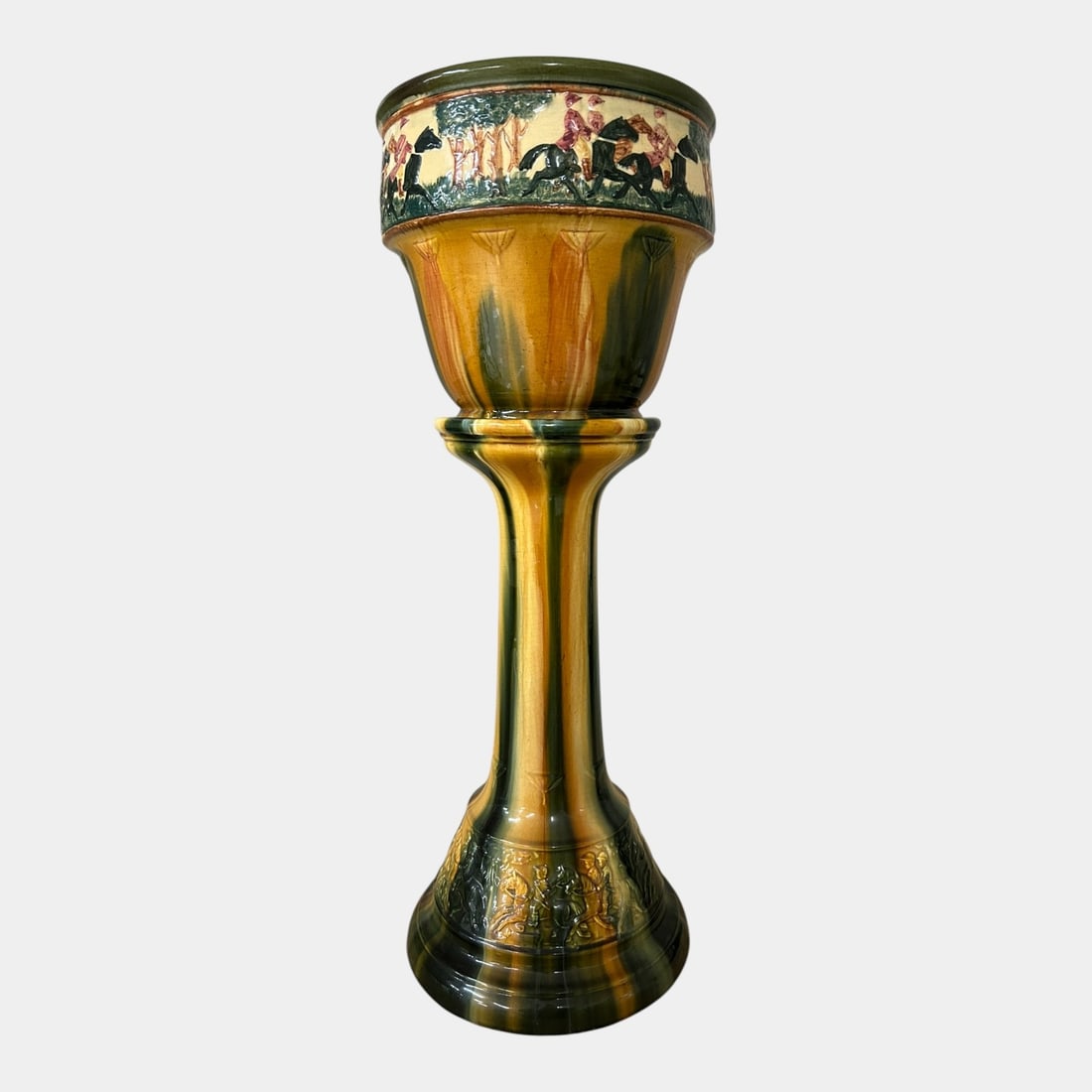 Roseville Blended Majolica Early 1900s Equestrian Horse Riders Jardiniere And Pedestal: Roseville Blended Majolica Early 1900s Equestrian Horse Riders Jardiniere And Pedestal Roseville Art Pottery jardiniere and pedestal set, featuring molded figural frieze decoration and rich variegated