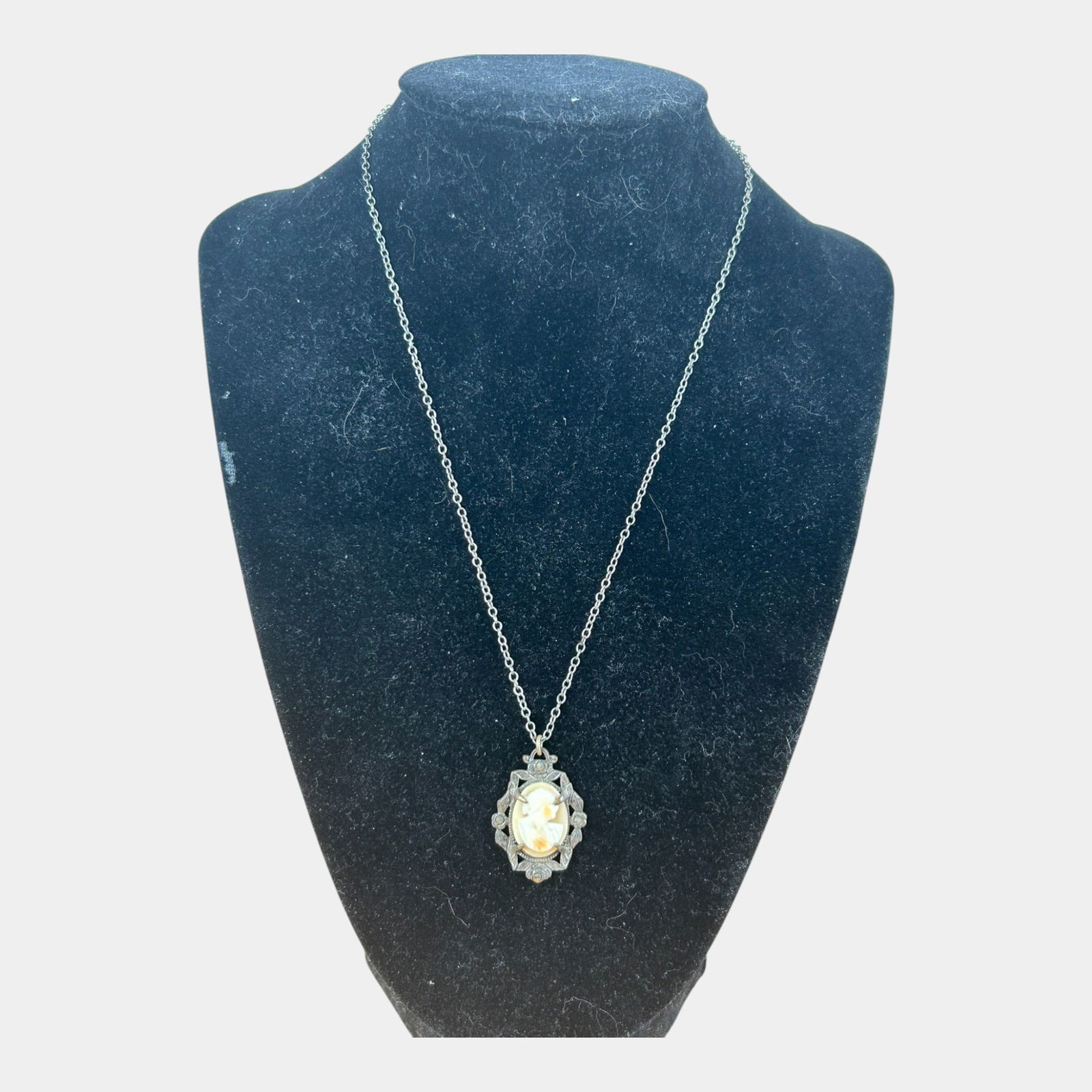 Cameo Pendant with Black Marcasites in Gothic Revival Setting: Professional, fast, and affordable in house shipping available for all items. Cameo Pendant with Black Marcasites in Gothic Revival SettingIntricately ornate and evocatively vintage, this antique