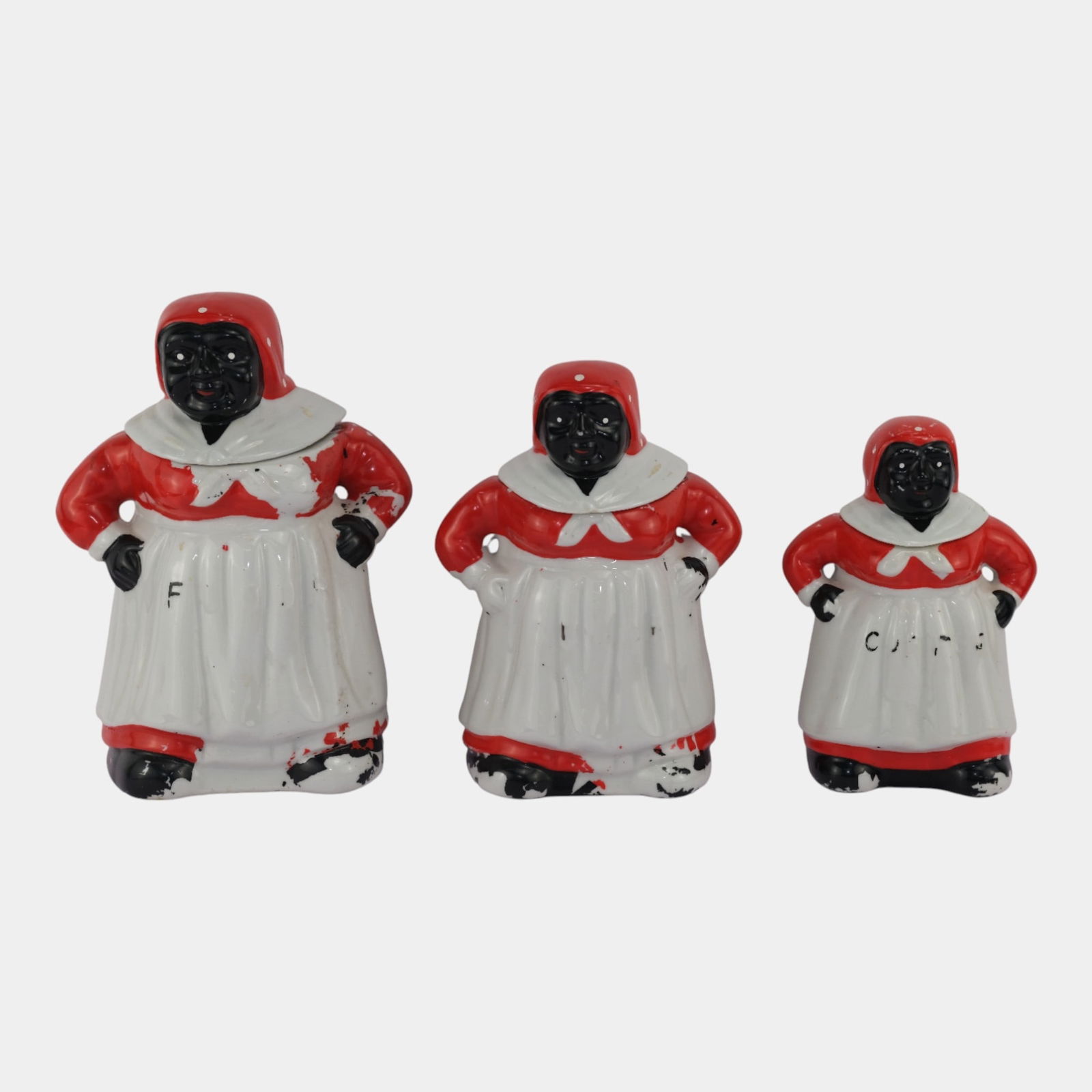 Black Americana 1930s Aunt Jemima Cold Painted Red Canister Set: Professional, fast, and affordable in house shipping available for all items. Black Americana 1930s Aunt Jemima Cold Painted Red Canister Set Age related wear. Tallest piece is 8 1/2" tall and 5" wid