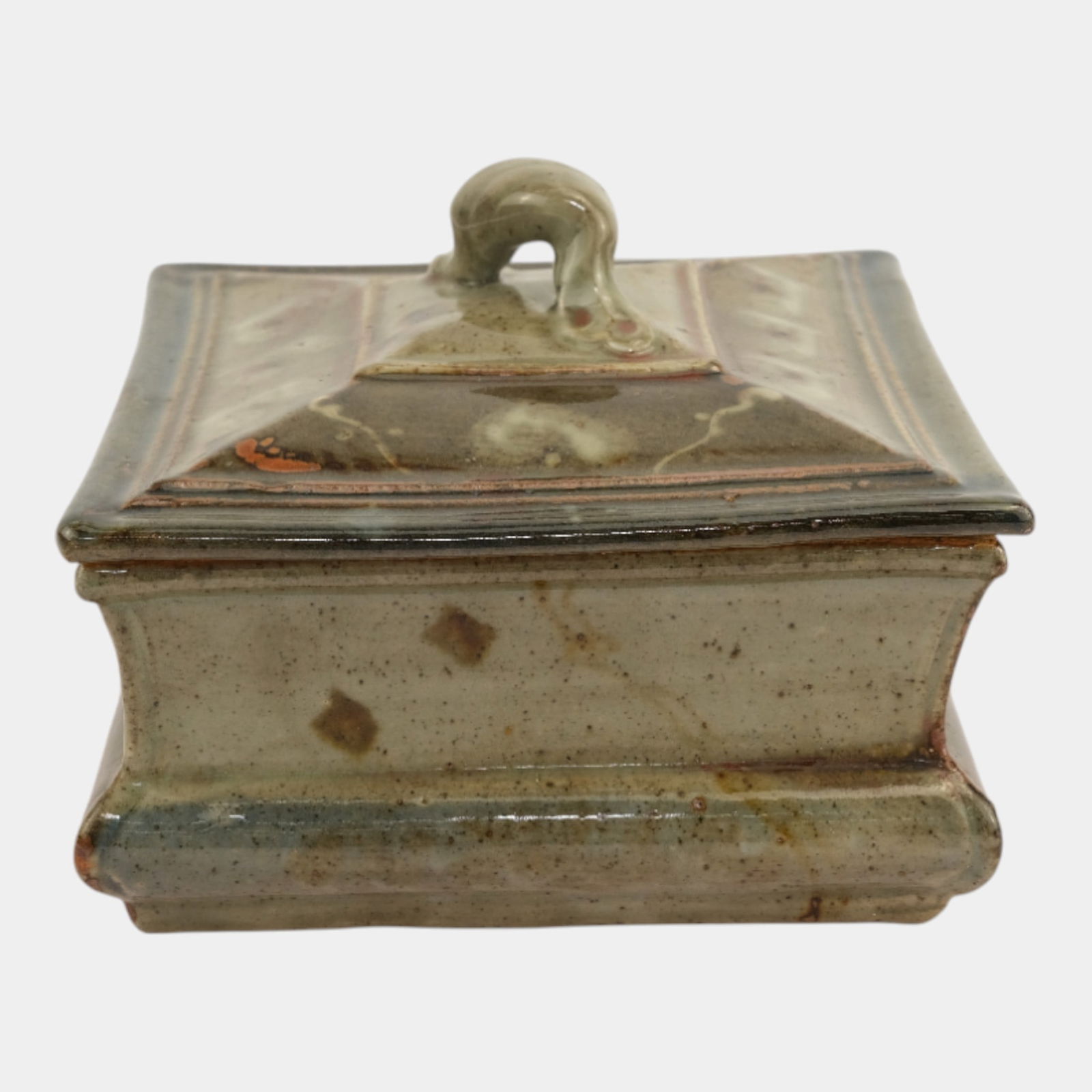 John Glick (1938-2017) Plum Tree Pottery Handled Square Lidded Box: We offer affordable in-house shipping on all items. John Glick (1938-2017) Plum Tree Pottery Handled Square Lidded Box Handcrafted lidded box by John Glick, featuring a squared architectural form wit