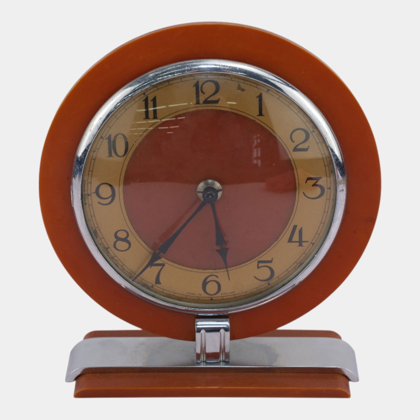 Art Deco Amber Bakelite Body & Stand With Chrome Bezel And Accents Electric Clock: We offer affordable in-house shipping on all items. Art Deco Amber Bakelite Body & Stand With Chrome Bezel And Accents Electric Clock Strikingly streamlined and warmly toned, this Art Deco mantel clo