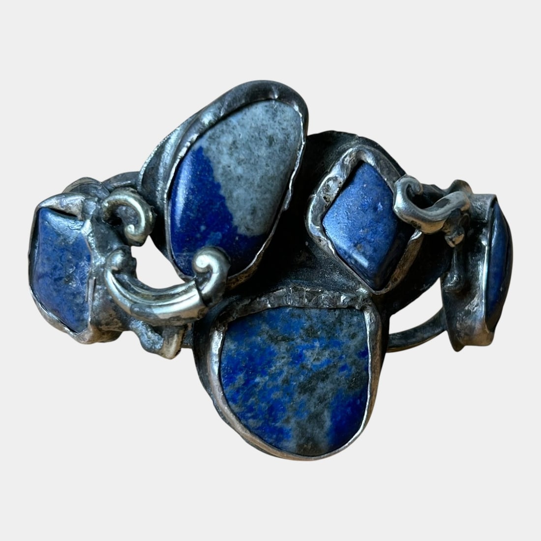 Sterling Silver Arts And Crafts Style Lapis Lazuli Handmade Cuff Bracelet: We offer affordable in-house shipping on all items. Strikingly organic and boldly sculptural, this Arts & Craftsâ€“inspired sterling silver cuff bracelet features irregular lapis lazuli stone
