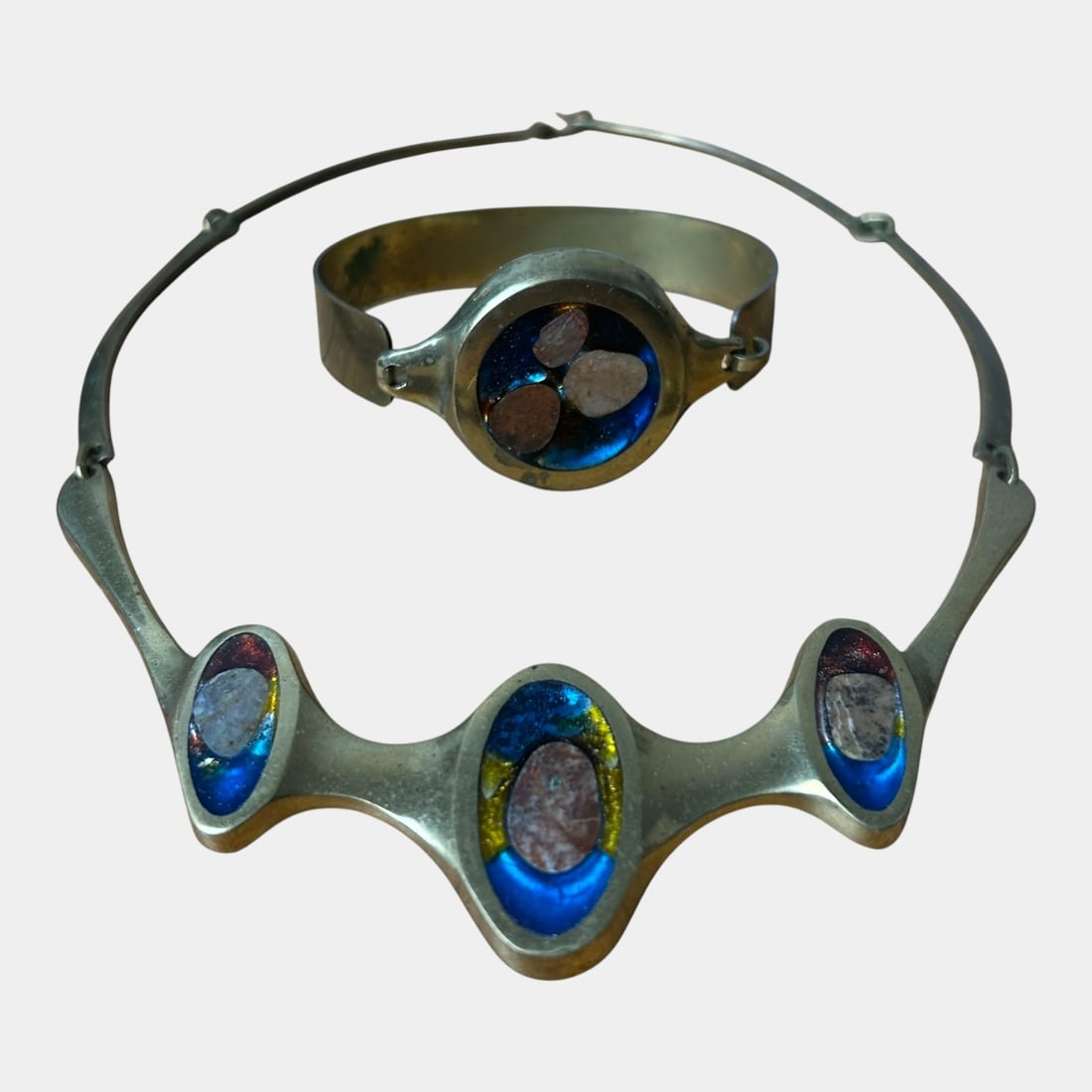 Brass Mid Century Modern Blue Enamel And Stone Accented Choker Necklace & Bracelet: We offer affordable in-house shipping on all items. Boldly sculptural and vividly modern, this Mid Century Modern brass choker and bracelet set features fluid organic forms accented with rich blue en