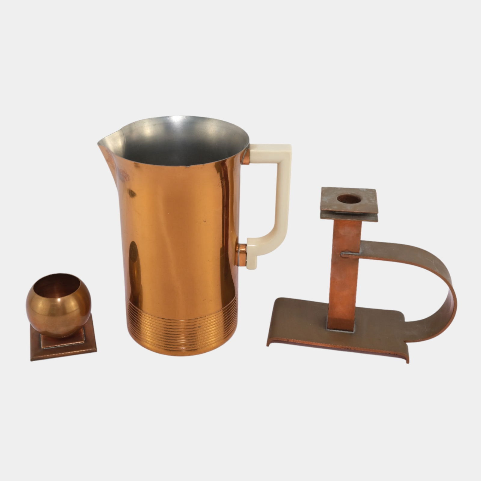 Albert Reimann & Walter Von Nessen For Chase Copper Candleholders And Water Pitcher: We offer affordable in-house shipping on all items. Albert Reimann & Walter Von Nessen For Chase Copper Candleholders And Water Pitcher Boldly functional and sculptural, this Art Deco copper set incl
