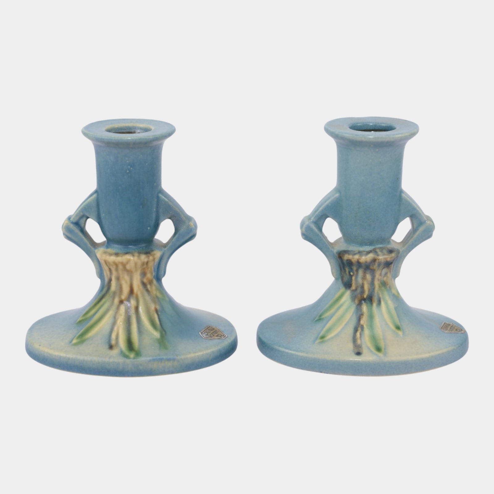 Roseville Moss Blue 1936 Vintage Art Deco Pottery Candle Holders 1107-4: We offer affordable in-house shipping on all items. Roseville Moss Blue 1936 Vintage Art Deco Pottery Candle Holders 1107-4 Excellent condition. Shows well with minor repair to handle on one holder.