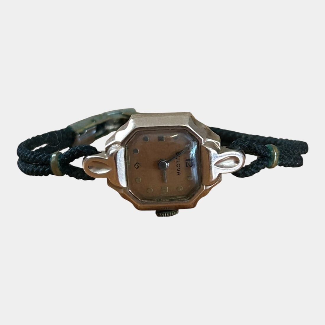 Bulova 14K Yellow Gold Cased Art Deco Lady's Cocktail Watch With Double Rope Band: We offer affordable in-house shipping on all items. Bulova Art Deco Ladyâ€™s Cocktail Watch, featuring a 14K yellow gold octagonal case with original dial and blued hands. Fitted with a doubl