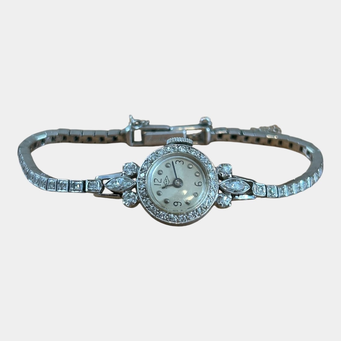 Pery Watch Co. Vintage Art Deco .900 Platinum & Diamond Case With 14K White Gold Diamond Band: We offer affordable in-house shipping on all items. Exquisitely glamorous and finely detailed, this Art Deco ladies wristwatch features a .900 platinum diamond-set case with a coordinated 14K white g