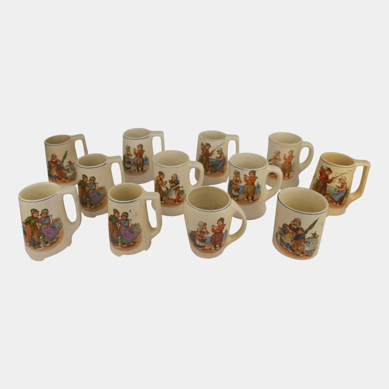 Roseville Creamware Dutch 12 Assorted Pottery Mugs: Professional, fast, and affordable in house shipping available for all items. Roseville Creamware Dutch 12 Assorted Pottery Mugs Shows well with minor age related wear as shown. Bottom marked as show