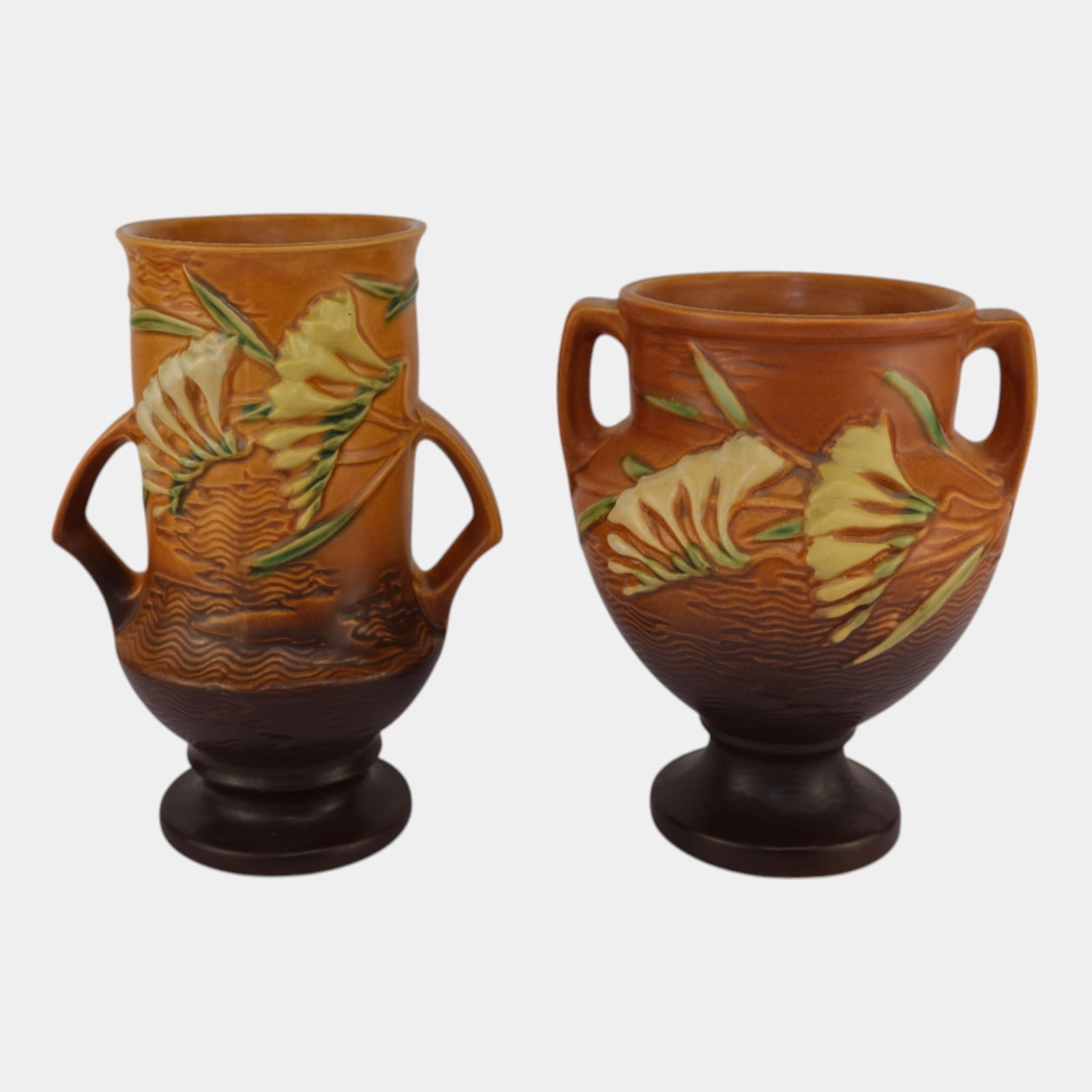 Roseville Freesia Lot Of Two Vintage Art Pottery Ceramic Vases: Professional, fast, and affordable in house shipping available for all items. Roseville Freesia Lot Of Two Vintage Art Pottery Ceramic Vases Nice mold and color. Excellent original condition. No chip