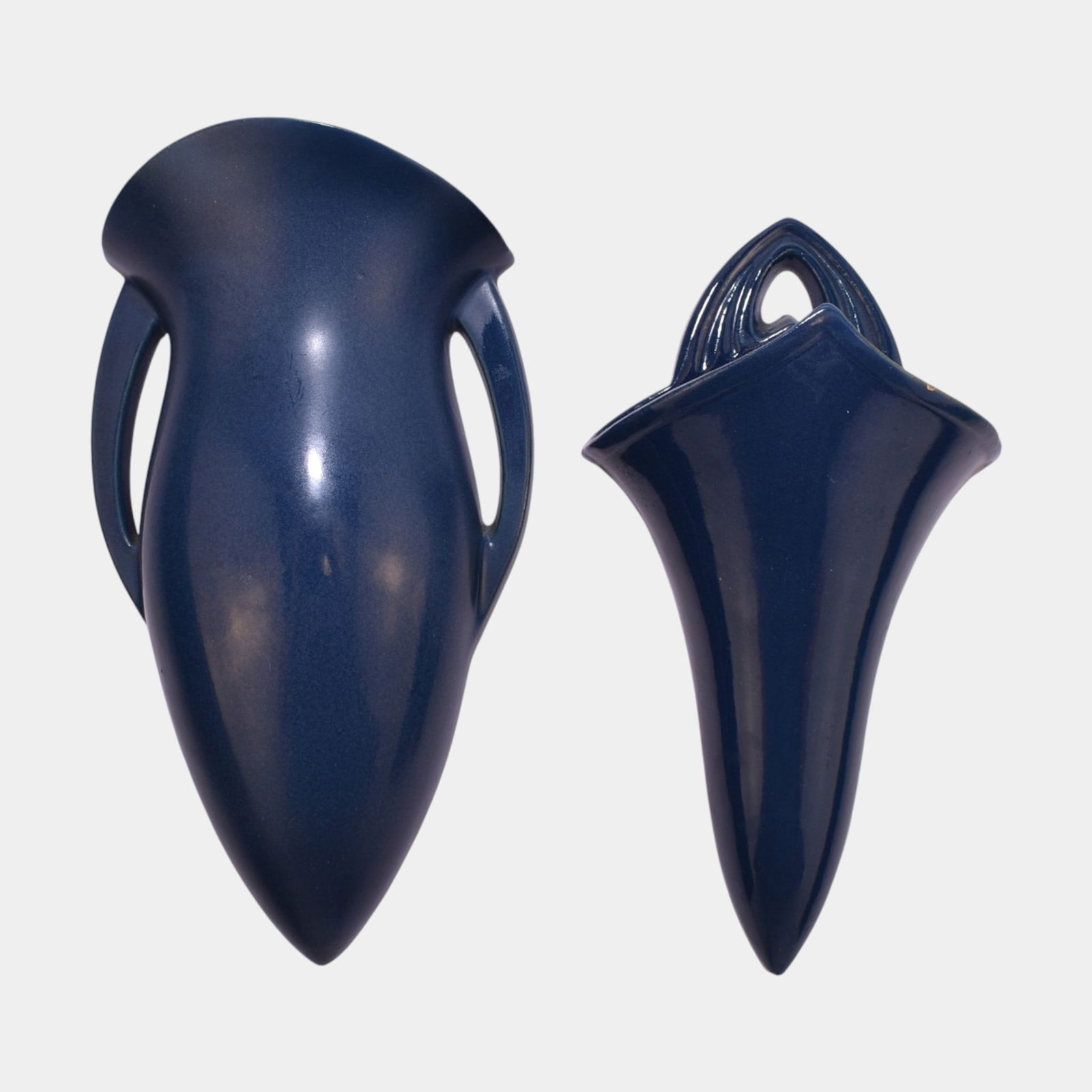 Roseville Rosecraft Colors Blue 1921 Vintage Art Pottery Wall Pockets: Professional, fast, and affordable in house shipping available for all items. Roseville Rosecraft Colors Blue 1921 Vintage Art Pottery Wall Pockets Shows well with minor repairs and nicks as shown. B