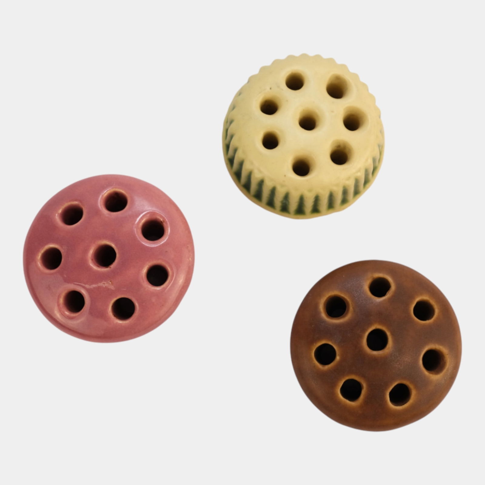 Roseville Donatello Pottery Ceramic Flower Frogs: Professional, fast, and affordable in house shipping available for all items. Roseville Donatello Pottery Ceramic Flower Frogs Excellent condition. Bottoms marked as shown. Frogs are approximately is