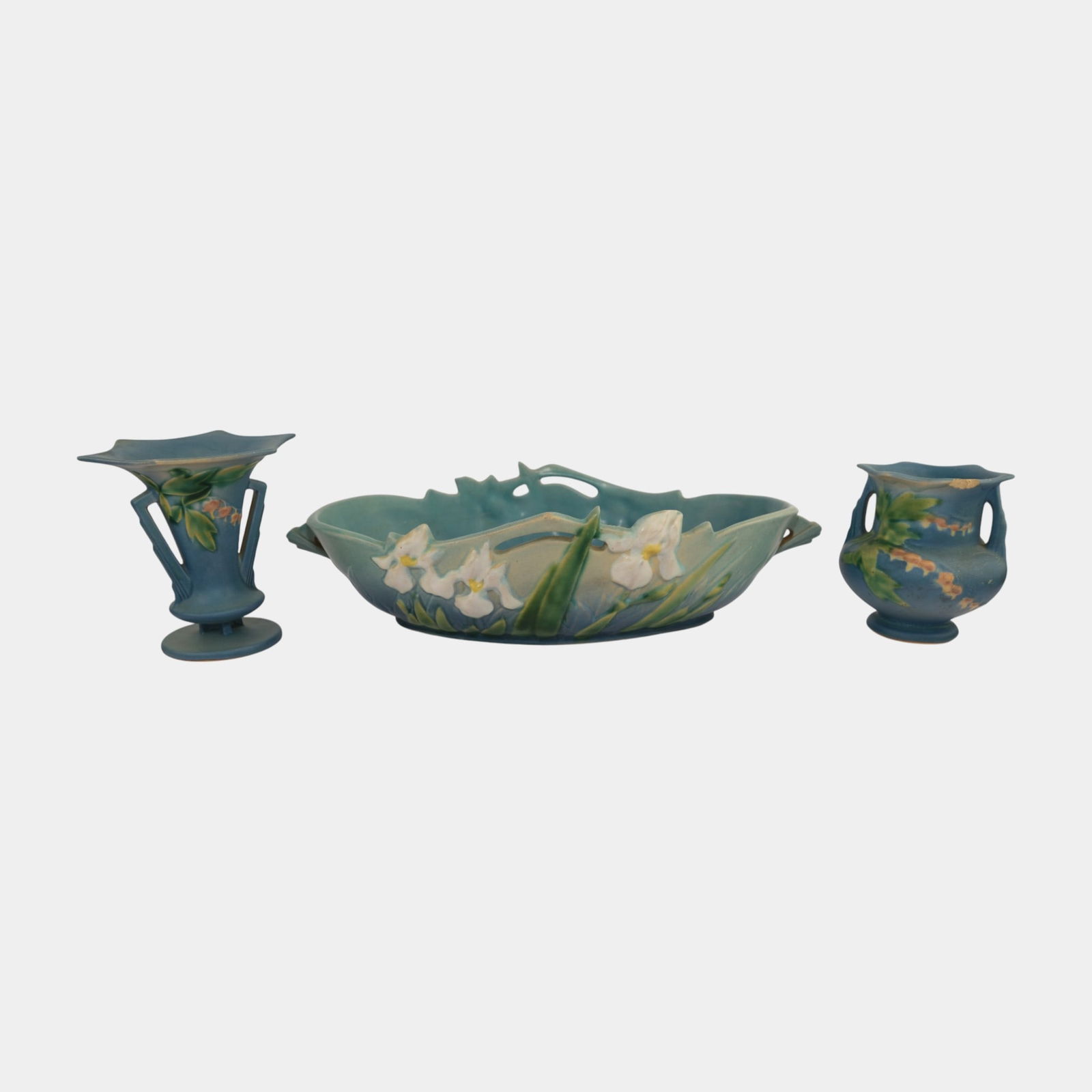 Roseville Blue Bleeding Heart & Iris Pottery Vases Bowl: Professional, fast, and affordable in house shipping available for all items. Roseville Blue Bleeding Heart & Iris Pottery Vases Bowl Smaller Bleeding Heart has chip to rim. Iris bowl has nick to rim