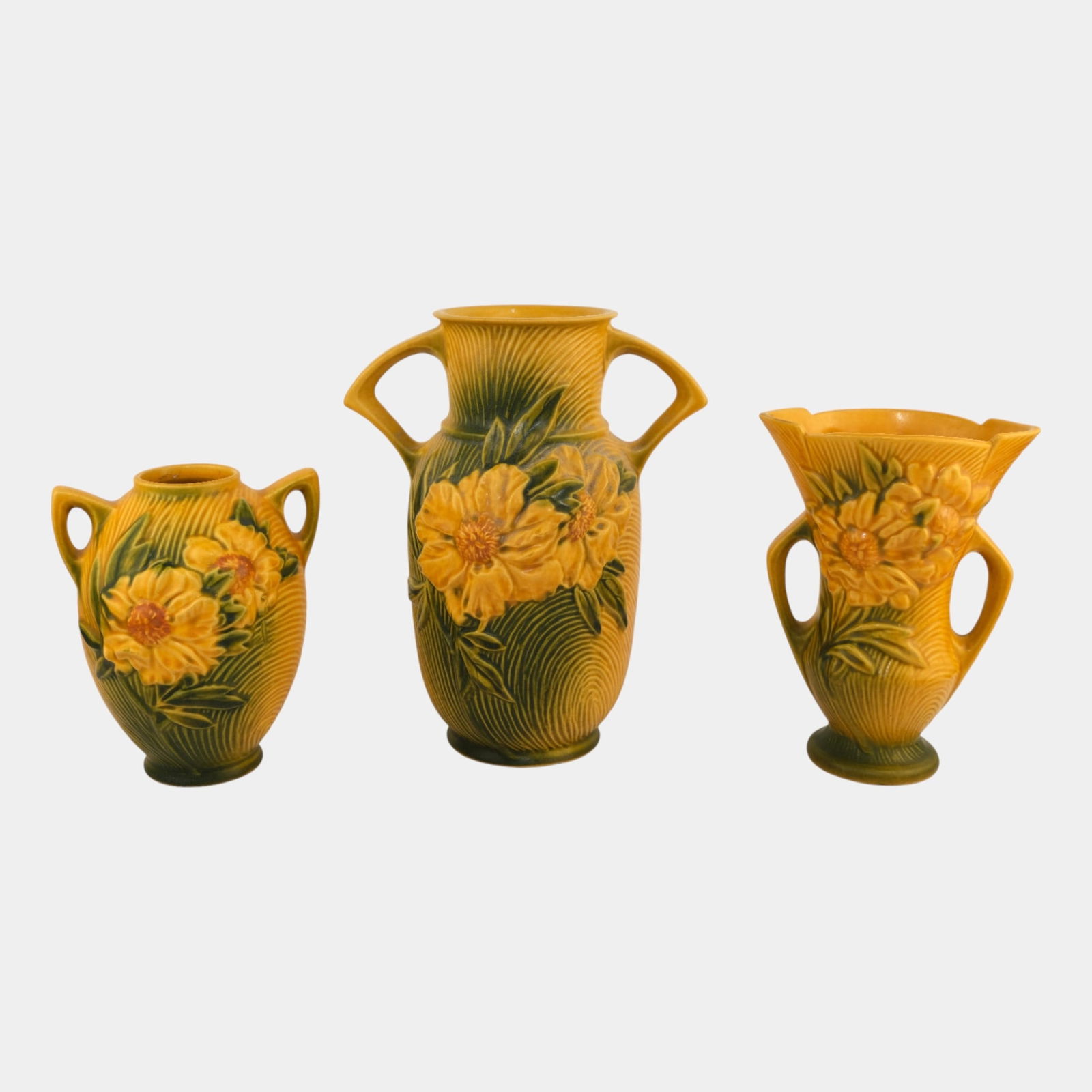 Roseville Art Pottery MCM Peony Yellow Vases: Professional, fast, and affordable in house shipping available for all items. Roseville Art Pottery MCM Peony Yellow Vases Excellent condition. Shows well with minor nick to base of tallest vase. No