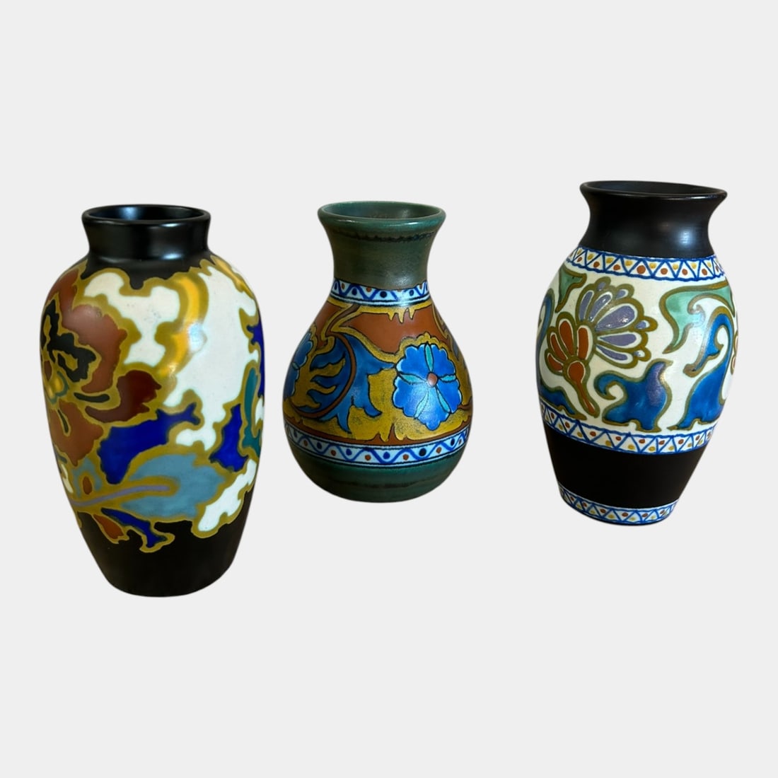 Gouda Holland Anier, Regina, & Crocus Black Green Art Nouveau Baluster Vases: We offer affordable in-house shipping on all items. Gouda Holland Anier, Regina, & Crocus Black Green Art Nouveau Baluster Vases Shown in classic baluster forms, these Gouda vases express Art Nouveau