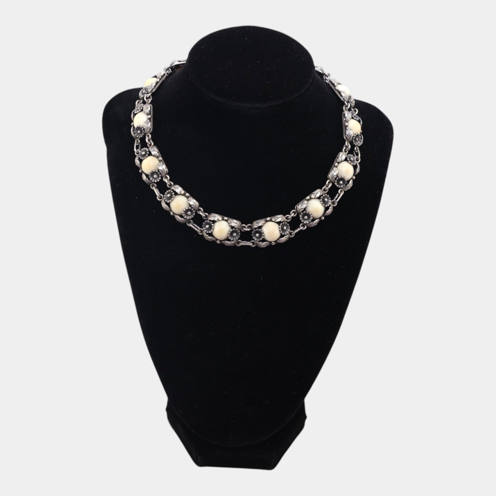 Neils Erik Denmark Mid Century Modernist Floral Framed Cream Cabochon Link Necklace: We offer affordable in-house shipping on all items. This Niels Erik Denmark sterling silver necklace features floral-framed cream cabochon links in a refined mid-century modernist design. Its articul
