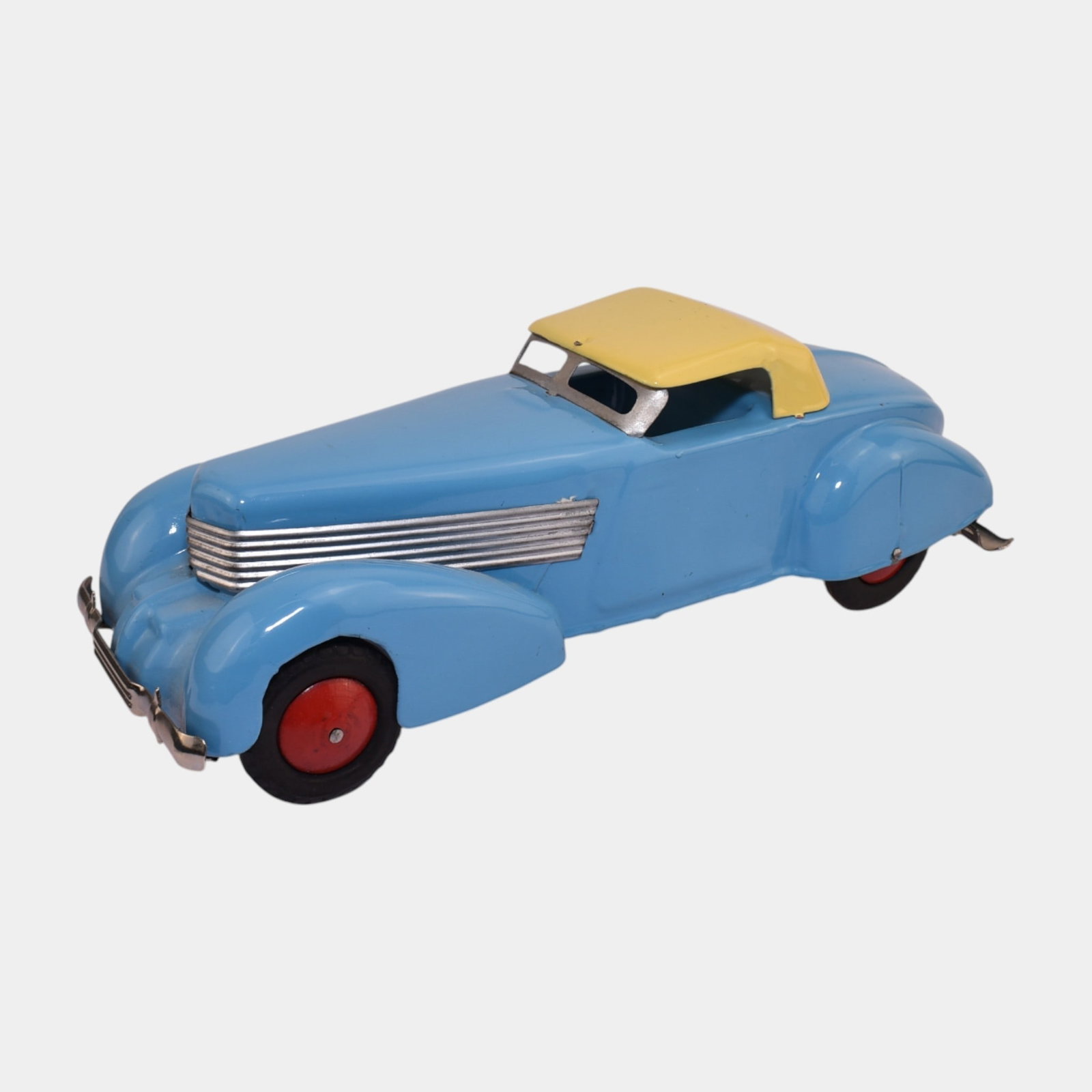 Wyandotte Toys USA Blue Pressed Steel 1936 Cord Sportsman Toy Car: We offer affordable in-house shipping on all items. Wyandotte Toys USA Blue Pressed Steel 1936 Cord Sportsman Toy Car Streamlined Wyandotte pressed-steel convertible in sky blue with yellow top and r