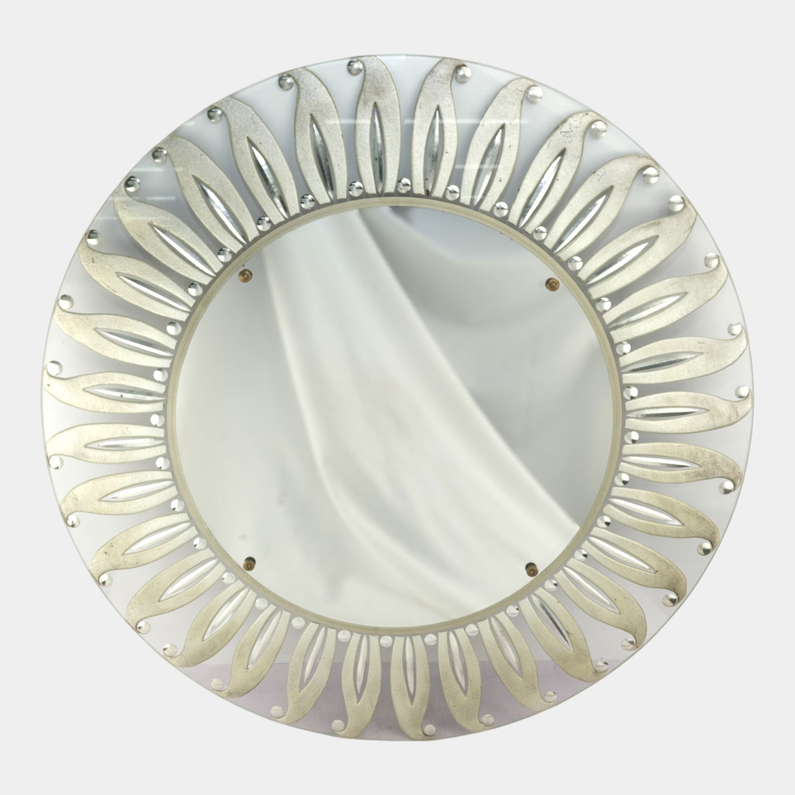 Mid Century Silver-Tone Metal Foliate Lancet Sunburst 27" Diameter Wall Mirror: We offer affordable in-house shipping on all items. Mid Century Silver-Tone Metal Foliate Lancet Sunburst 27" Diameter Wall Mirror Of generous proportion and refined decorative ambition, this mid-cen