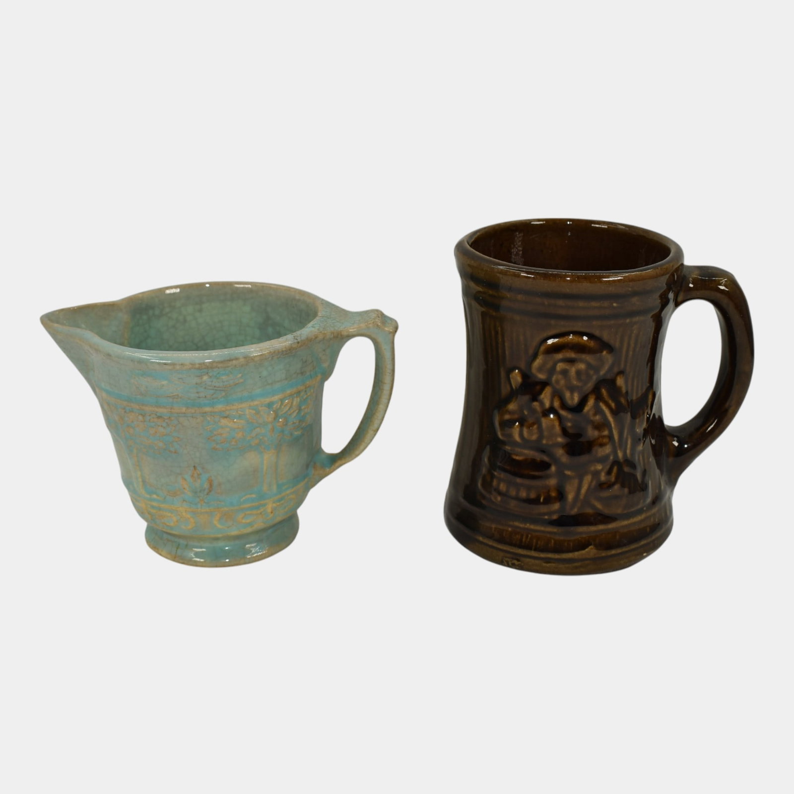 Hull Ceramic Blue Creamer And Brown Mug: Professional, fast, and affordable in house shipping available for all items. Hull Ceramic Blue Creamer And Brown Mug Excellent condition. Creamer has some crazing. Creamer bottom marked with H 2712.