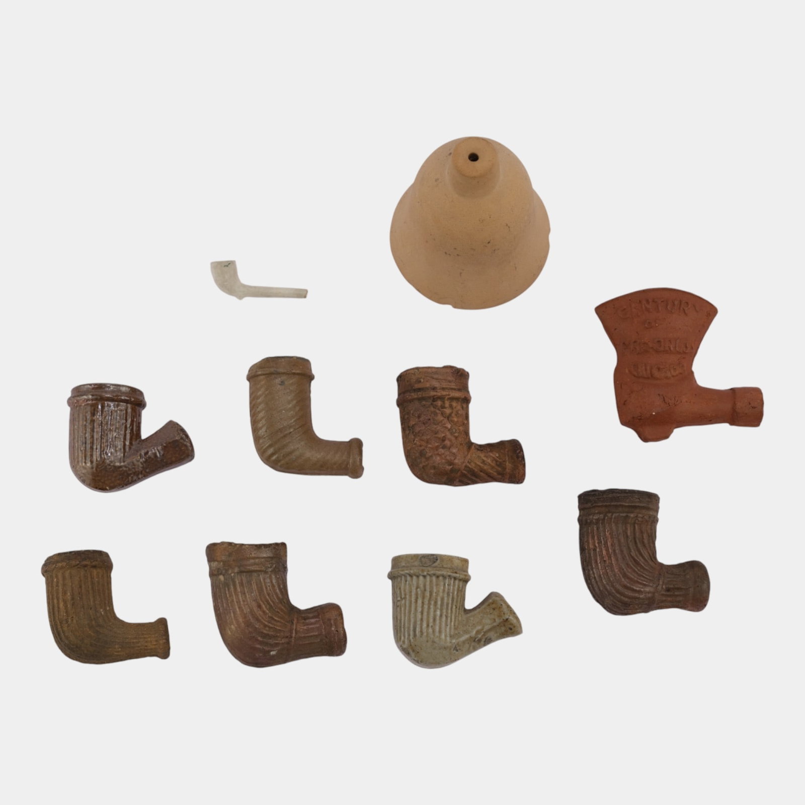 Assorted Ceramic Smoking Pipe Bowls With Carved Textured Surfaces: Professional, fast, and affordable in house shipping available for all items. Assorted Ceramic Smoking Pipe Bowls With Carved Textured Surfaces Condition as shown. Largest piece is 2 1/2" tall and 2