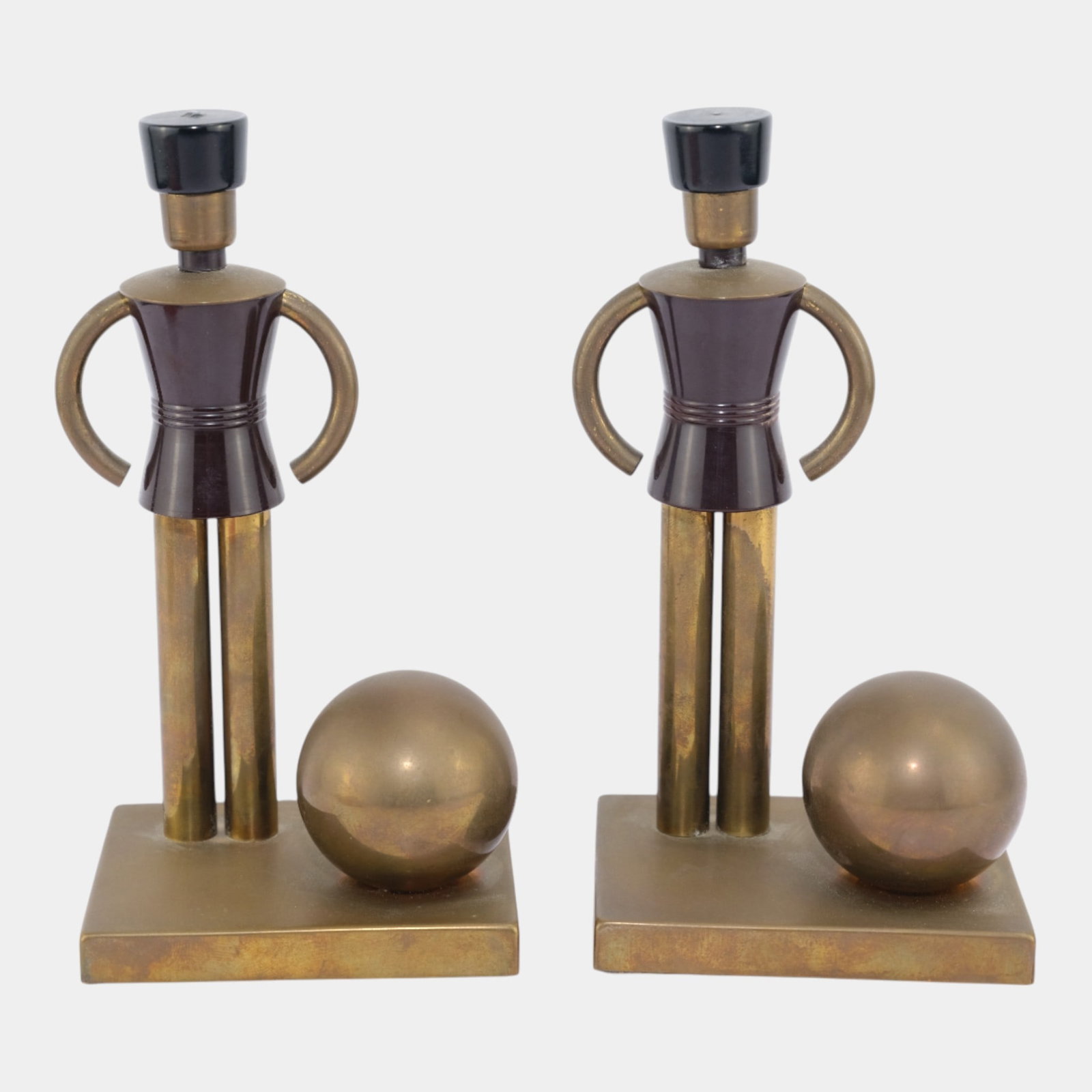 Walter Von Nessen For Chase Brass And Black Bakelite "Sentinel Soldier" Bookends: Professional, fast, and affordable in house shipping available for all items. Walter Von Nessen For Chase Brass And Black Bakelite "Sentinel Soldier" Bookends Boldly graphic and playfully modern, thes