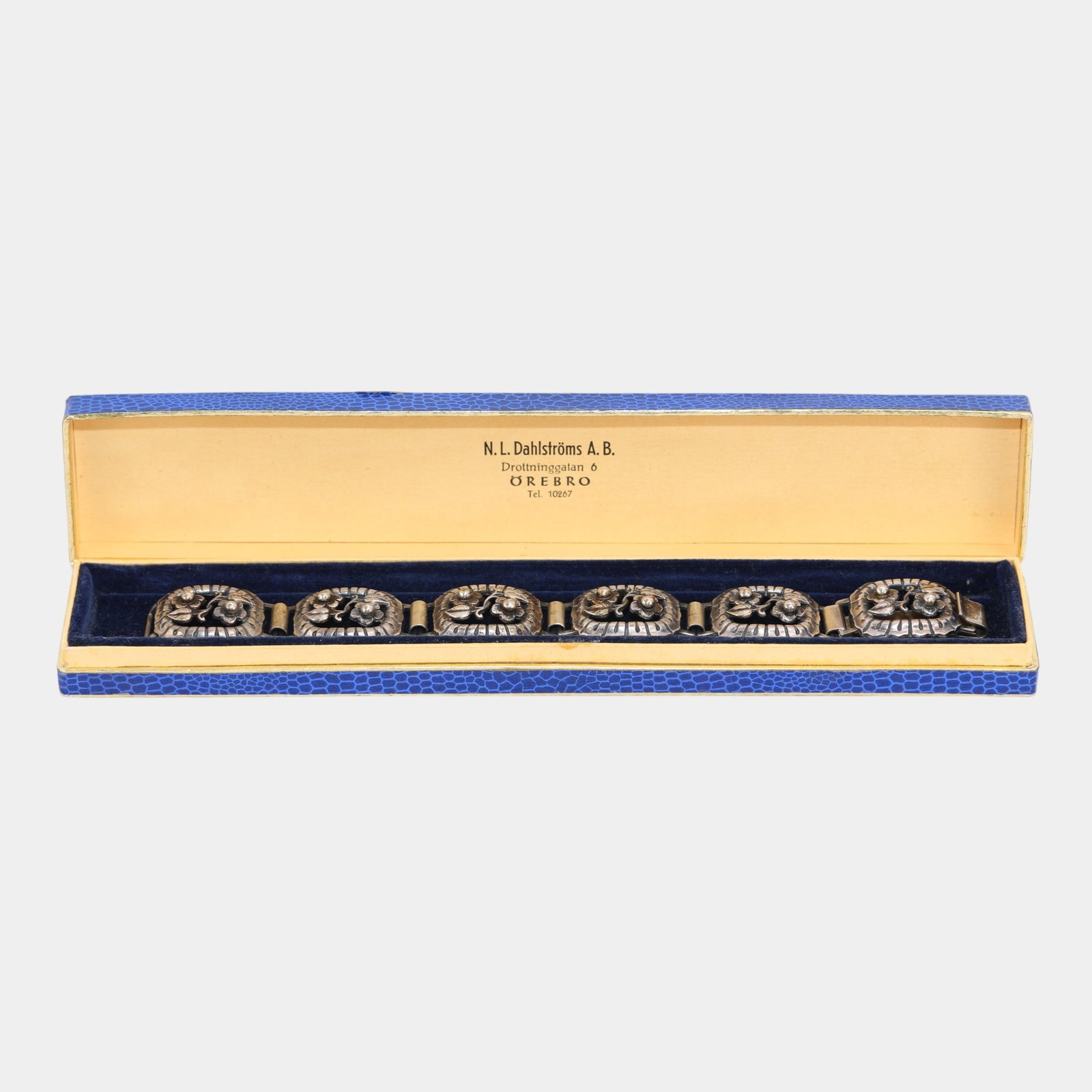 Gustav Dahlgren & Co. Swedish Mid Century Modern Floral Sterling Silver Bracelet: Professional, fast, and affordable in house shipping available for all items. By Gustav Dahlgren & Co., this Swedish mid-century modern sterling silver bracelet features sculpted floral panel links wi