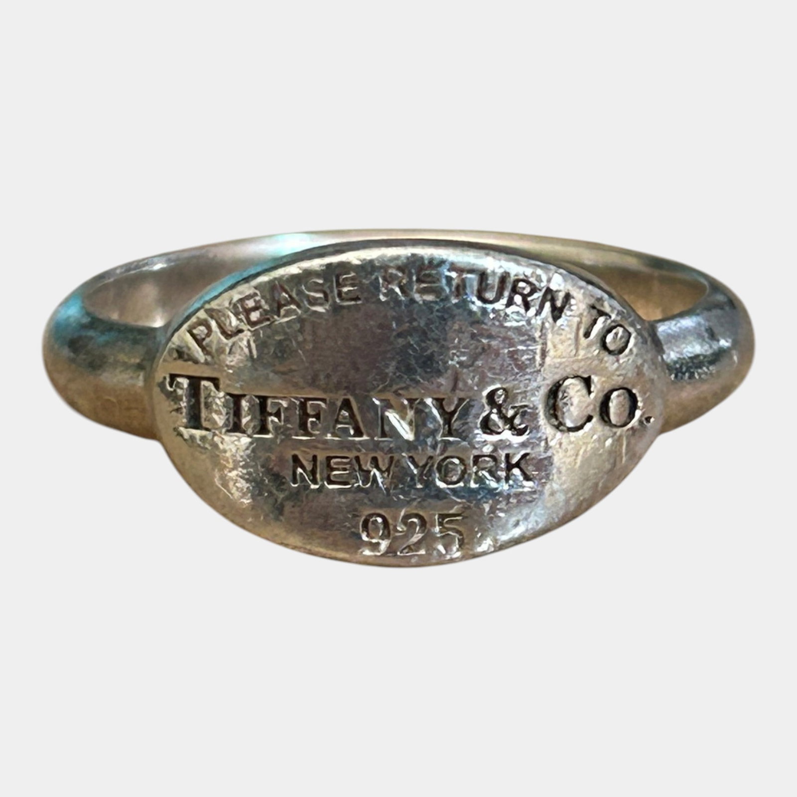 Tiffany & Co. Sterling Silver 925 Please Return To Tiffany Oval Signet Ring Size 7.5: Professional, fast, and affordable in house shipping available for all items. Iconic and boldly styled, this modern ring features a smooth oval face engraved with the classic â€œPlease Return t