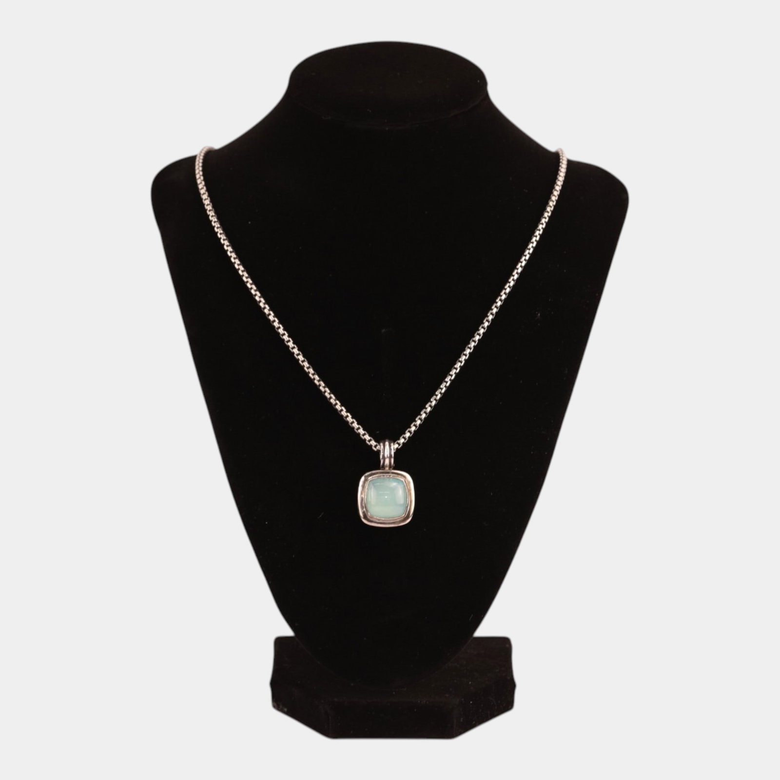 David Yurman Designer 14K Gold & Sterling Silver Box Chain Chalcedony Stone Pendent: Professional, fast, and affordable in house shipping available for all items. Refined and luxurious, this designer necklace features a softly rounded square chalcedony stone set in sterling silver wit