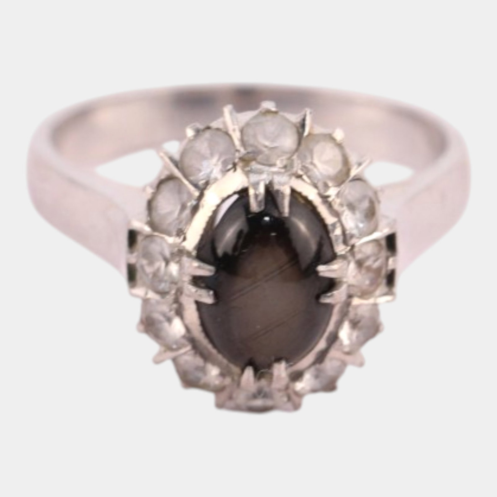Charles Jeweler 18K White Gold Black Sapphire Bordered With Cubic Zirconia Stones Ring Size 5.5: Professional, fast, and affordable in house shipping available for all items. Strikingly designed and contemporary, this ring features a bold oval black sapphire centerpiece framed by sparkling cubic 