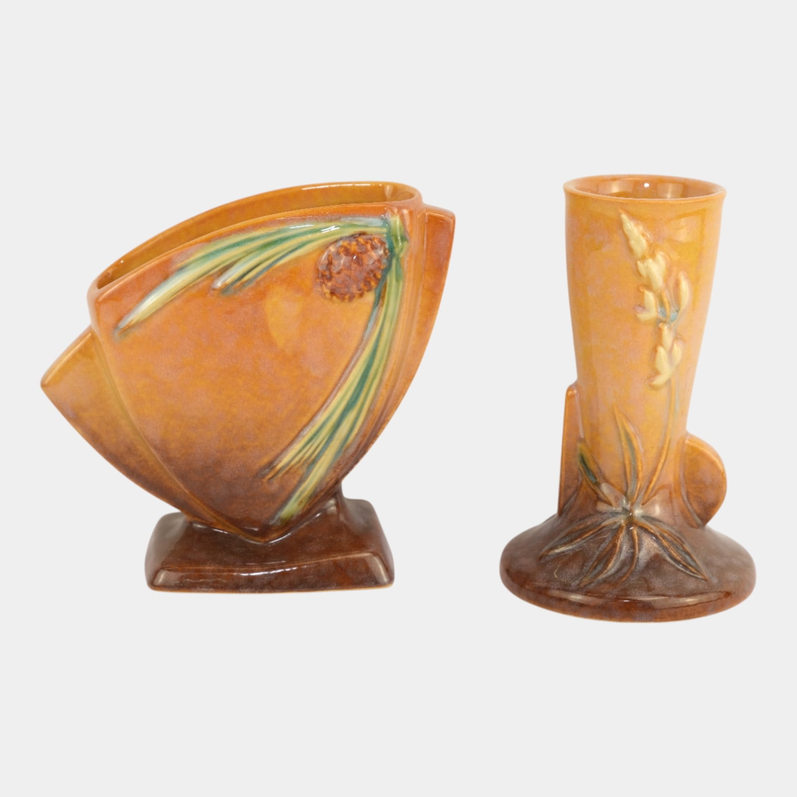 Roseville Wincraft Orange Vases: We offer affordable in-house shipping on all items. Roseville Wincraft Orange Vases Excellent condition. Age related wear. Bottom marked as shown. Tallest item is 6 1/4" tall and 4 1/4" wide.