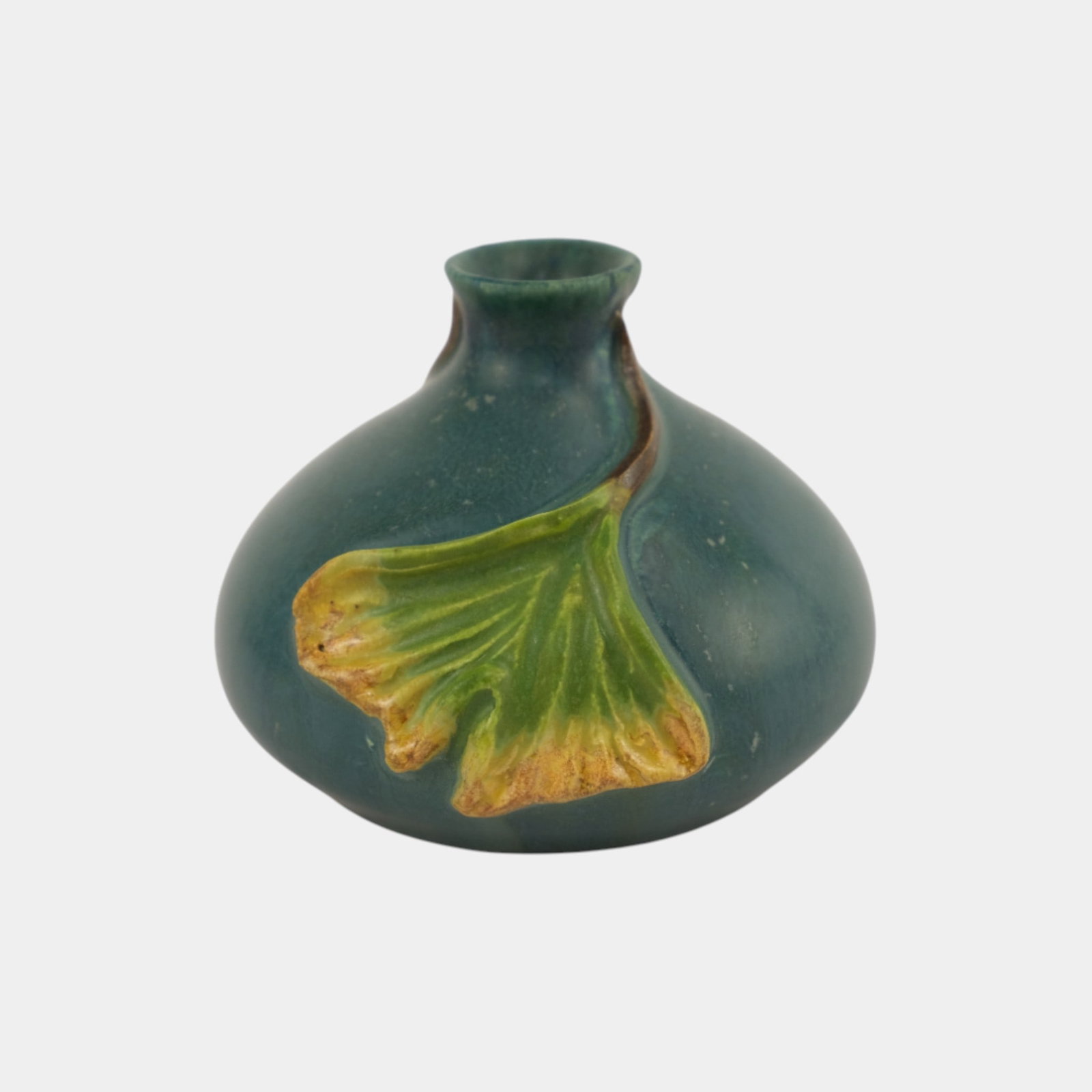 Ephraim Faience 2021 Pot Of The Week Miniature Teal Blue Ginkgo Bottle Vase: We offer affordable in-house shipping on all items. Ephraim Faience 2021 Pot Of The Week Miniature Teal Blue Ginkgo Bottle Vase Ephraim Faience vase in deep teal matte glaze featuring a raised ginkgo 