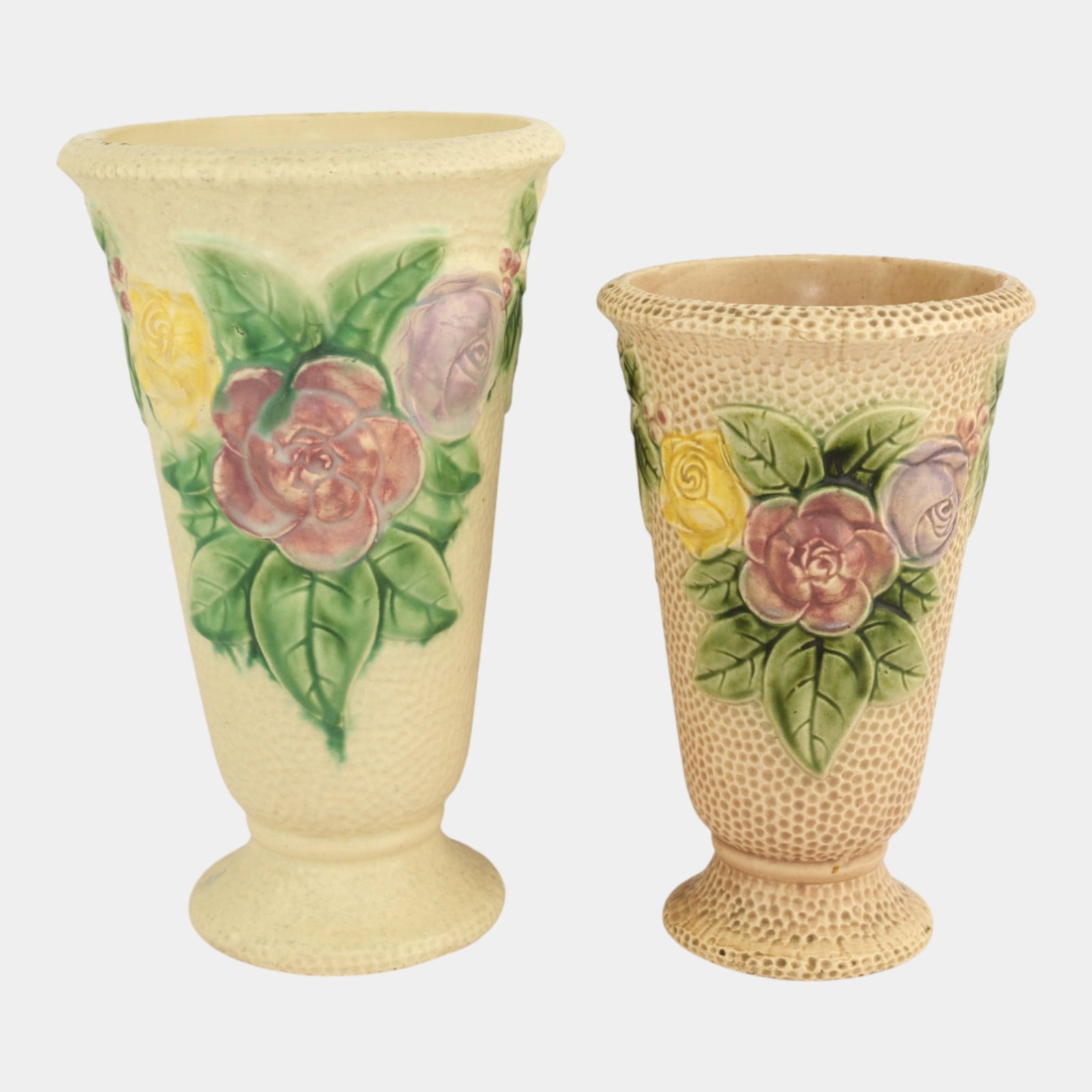 Roseville Rozane 1917 Vintage Art Pottery Floral Ivory Tint Ceramic Vases: We offer affordable in-house shipping on all items. Roseville Rozane 1917 Vintage Art Pottery Floral Ivory Tint Ceramic Vases Excellent condition. Shorter vase shows well with minor hairline on interi