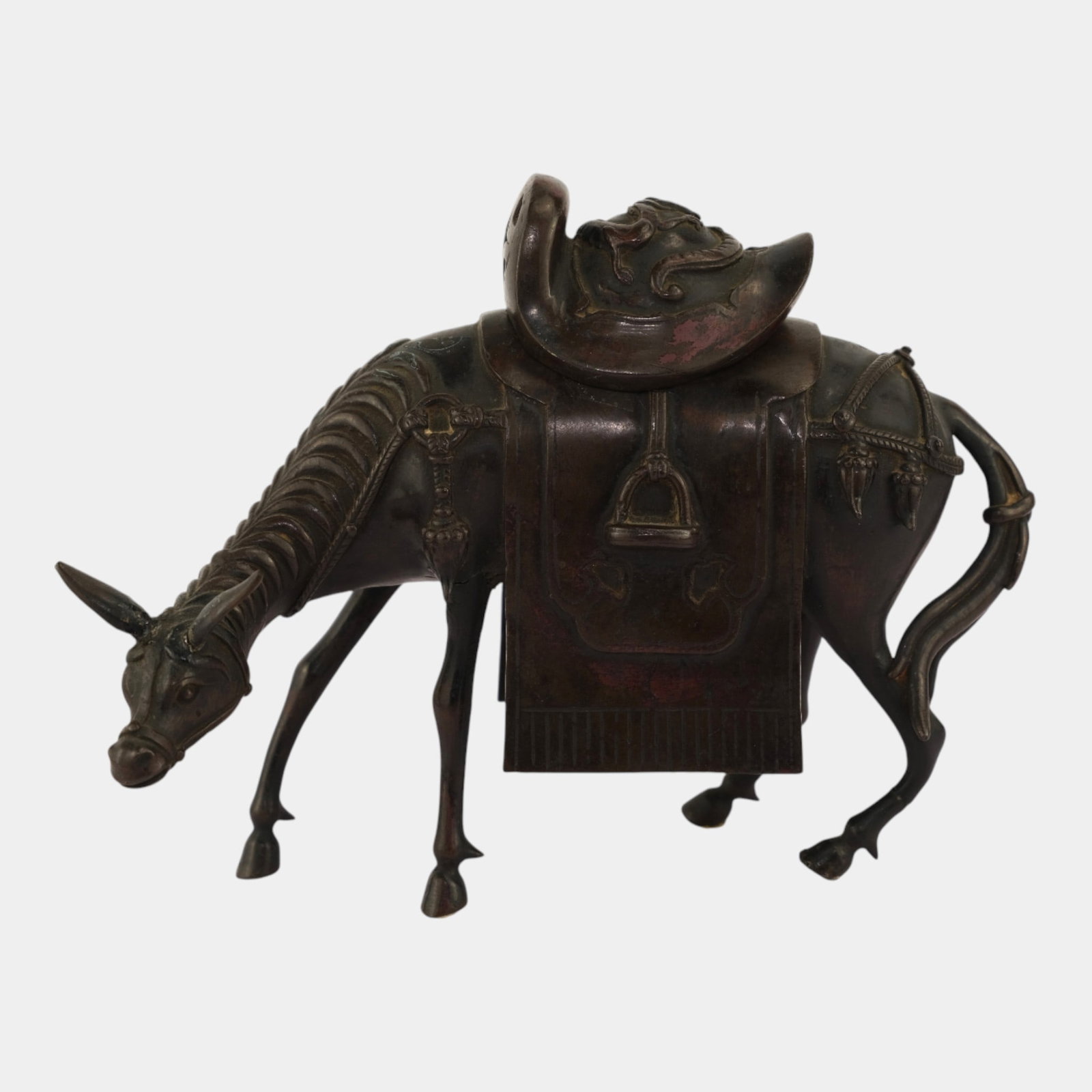 Metal Horse Incense Burner With Removable Saddle Lid: We offer affordable in-house shipping on all items. Metal Horse Incense Burner With Removable Saddle Lid Ear has been broken off. Age related wear. 6" tall and 7 1/2" wide.