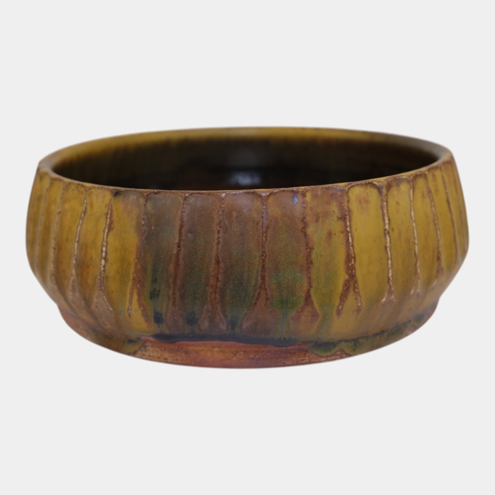 Studio Art Pottery Ceramic Brown Green Ribbed Bowl: We offer affordable in-house shipping on all items. Studio Art Pottery Ceramic Brown Green Ribbed Bowl Handcrafted studio pottery bowl featuring a ribbed exterior and a rich drip glaze in earthy amber