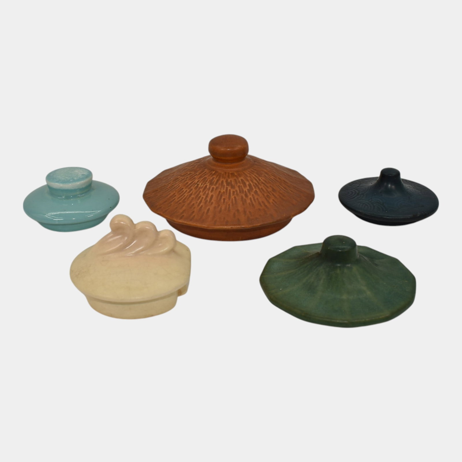 Lot of Roseville Clematis Cookie Jar Tea Pot and Misc Lids: We offer affordable in-house shipping on all items. Lot of Roseville Clematis Cookie Jar Tea Pot and Misc Lids Age related wear as shown. Largest lid is 6" tall and 3" wide.