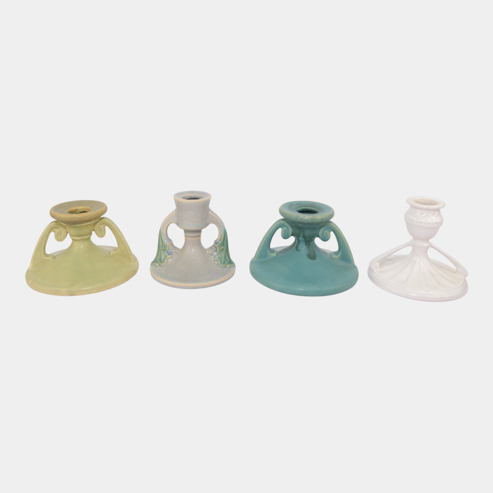 Roseville Tuscany Carnelian Ivory Lot of 4 Candle Holders: We offer affordable in-house shipping on all items. Roseville Tuscany Carnelian Ivory Lot of 4 Candle Holders Excellent original condition. No chips, cracks, damage or repair of any kind. Bottoms mark